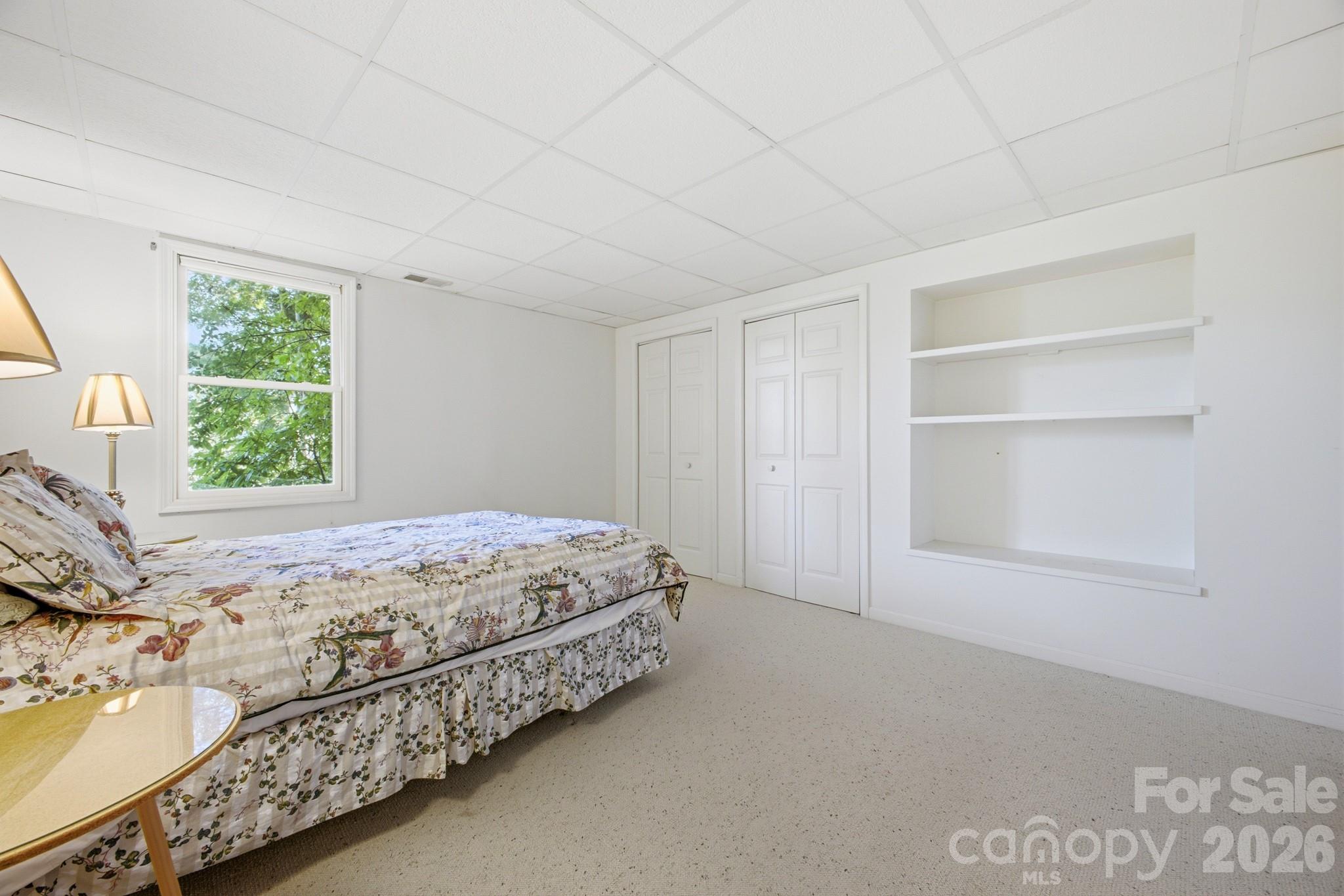 Bedroom #4 is in the Lower Level Living Area - 1870 Riverview Court, Hendersonville