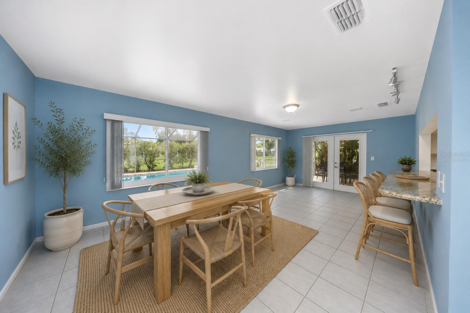 Virtually Staged Dining Room - 9237 AMAZON DR, NEW PORT RICHEY