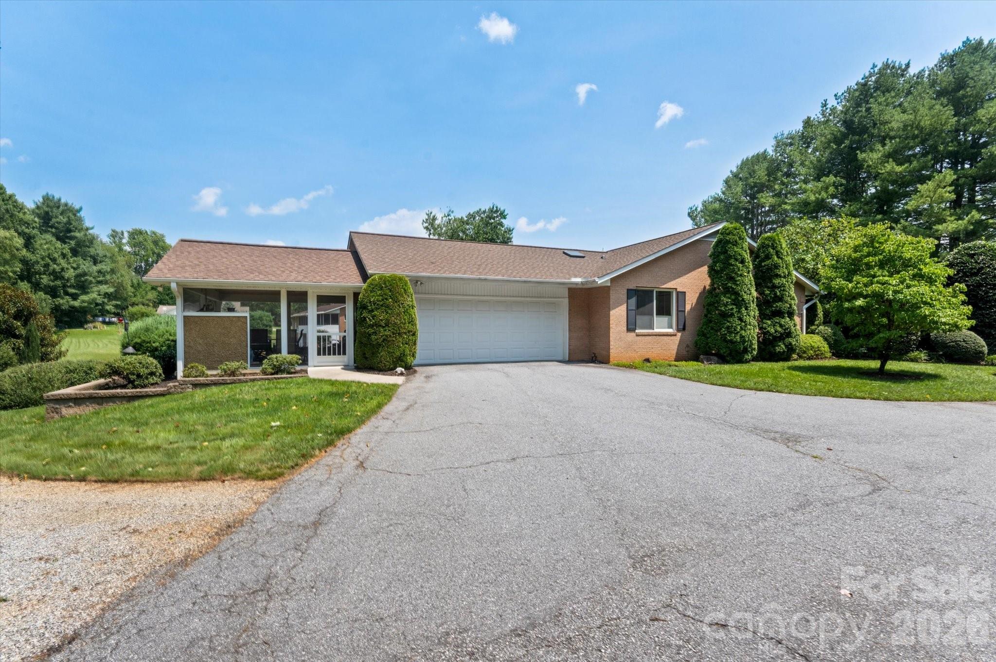 Two car garage on side of home - 12 Highlander Lane, Hendersonville