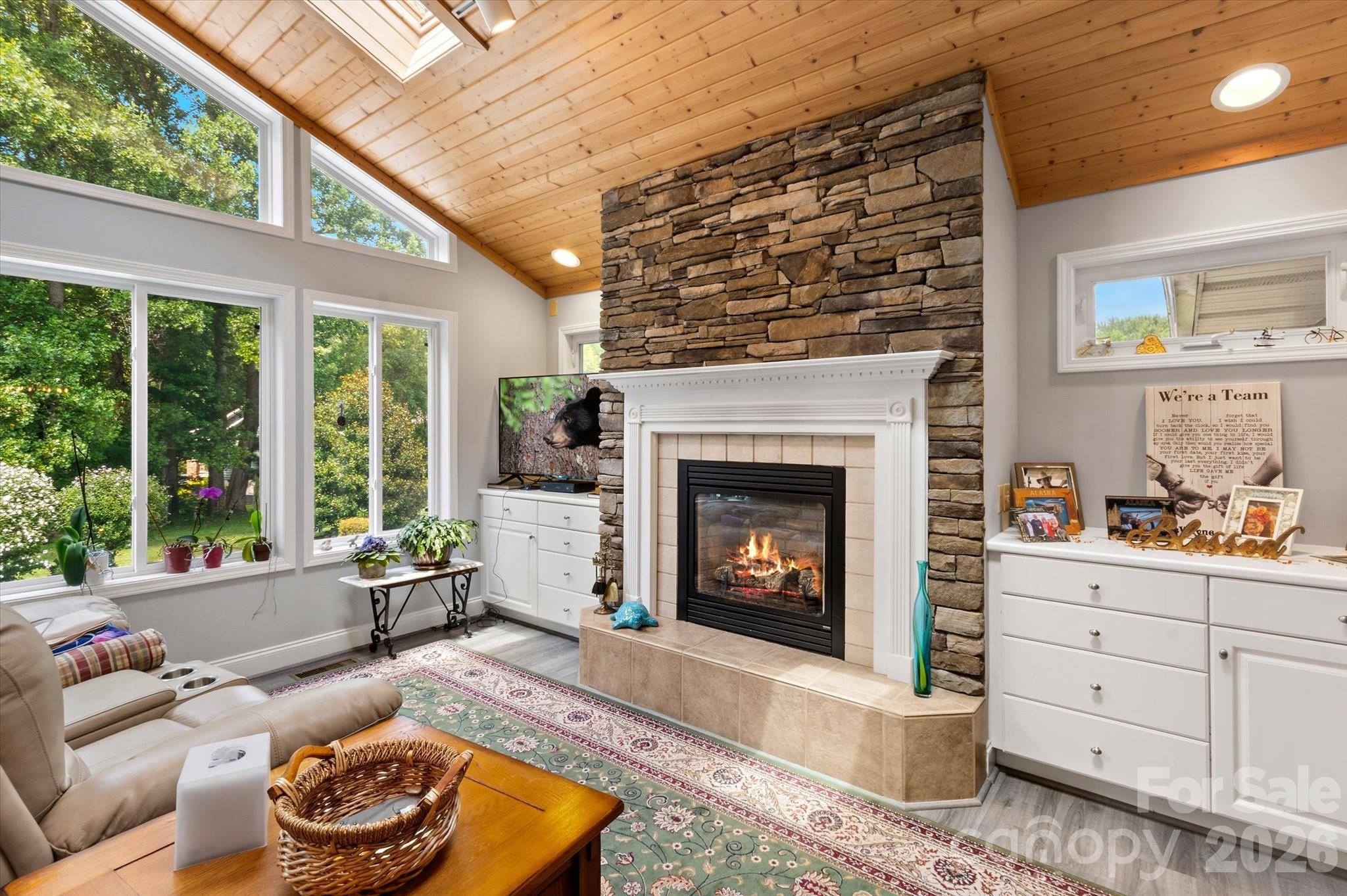 stacked stone gas log fireplace - 12 Highlander Lane, Hendersonville
