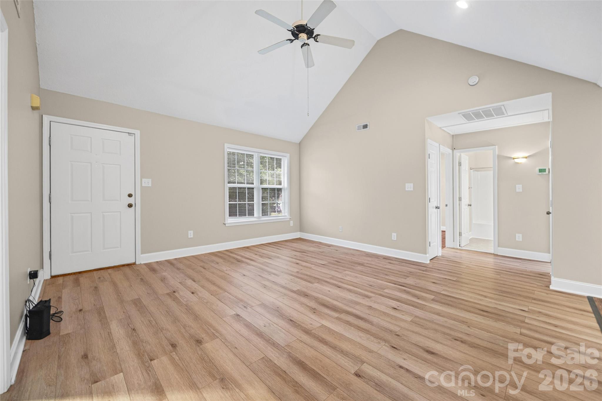 Livingroom view showing entry to secondary bedrooms and bath - 5408 Mallard Lane, Gastonia