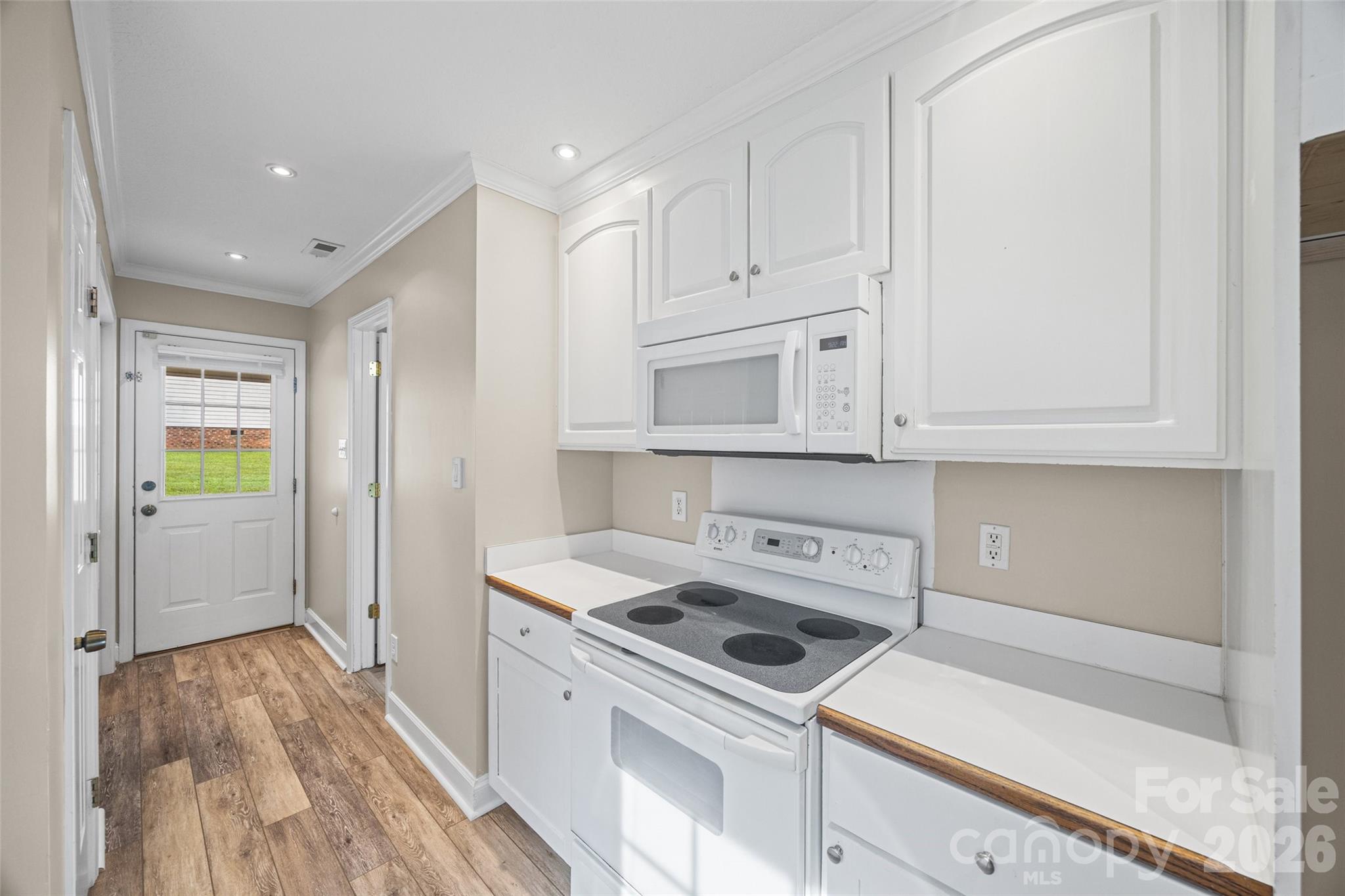 Kitchen view showing entry to carport - 5408 Mallard Lane, Gastonia