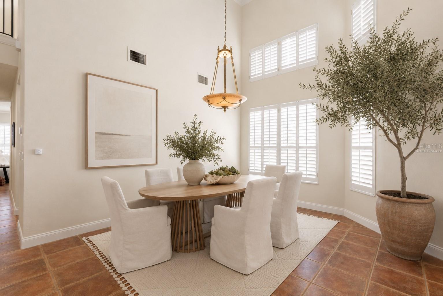 Virtually Staged Dining Room - 6 MONTERREY DR, PALM COAST