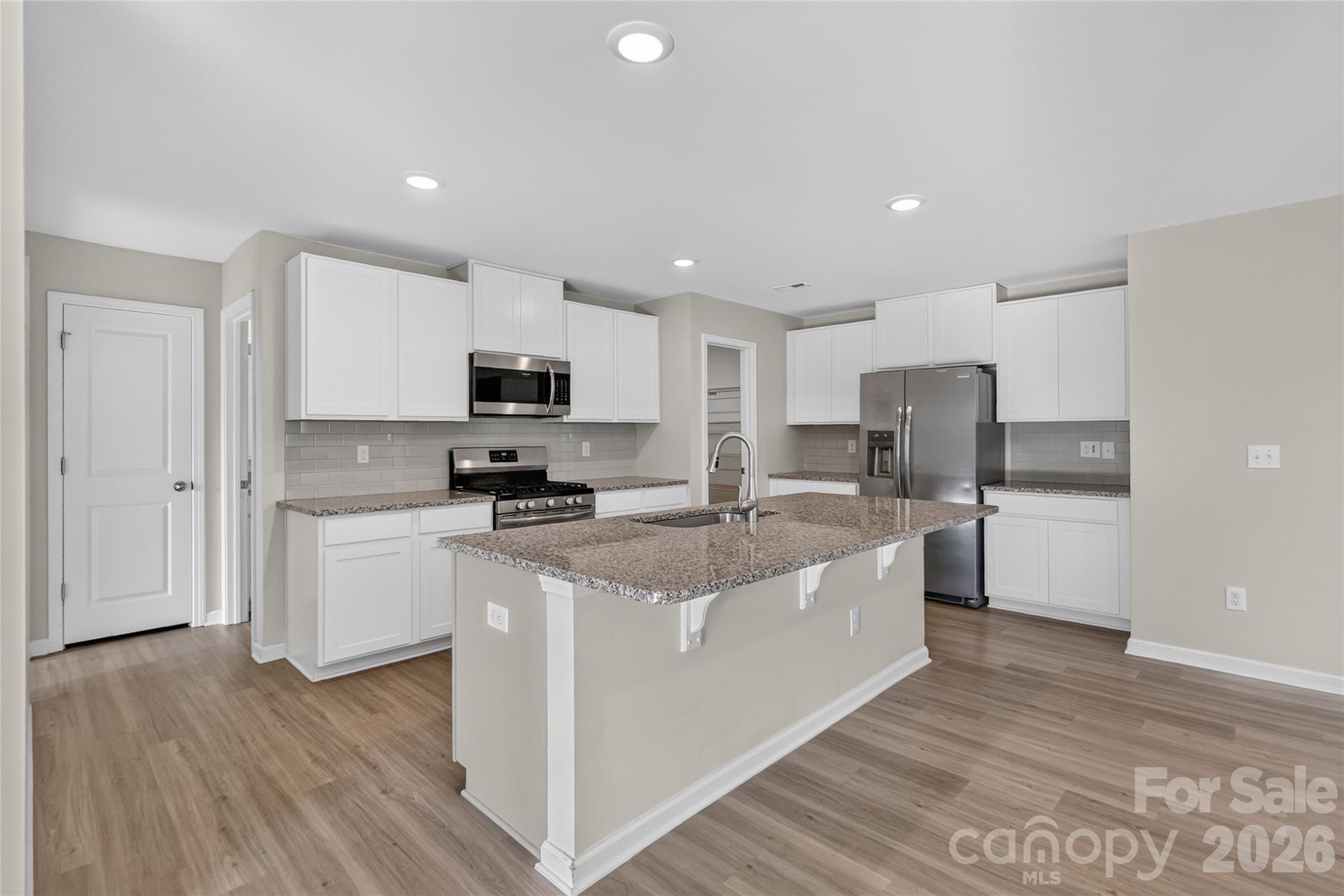 Island with Seating - 1503 Forkhorn Drive, Monroe