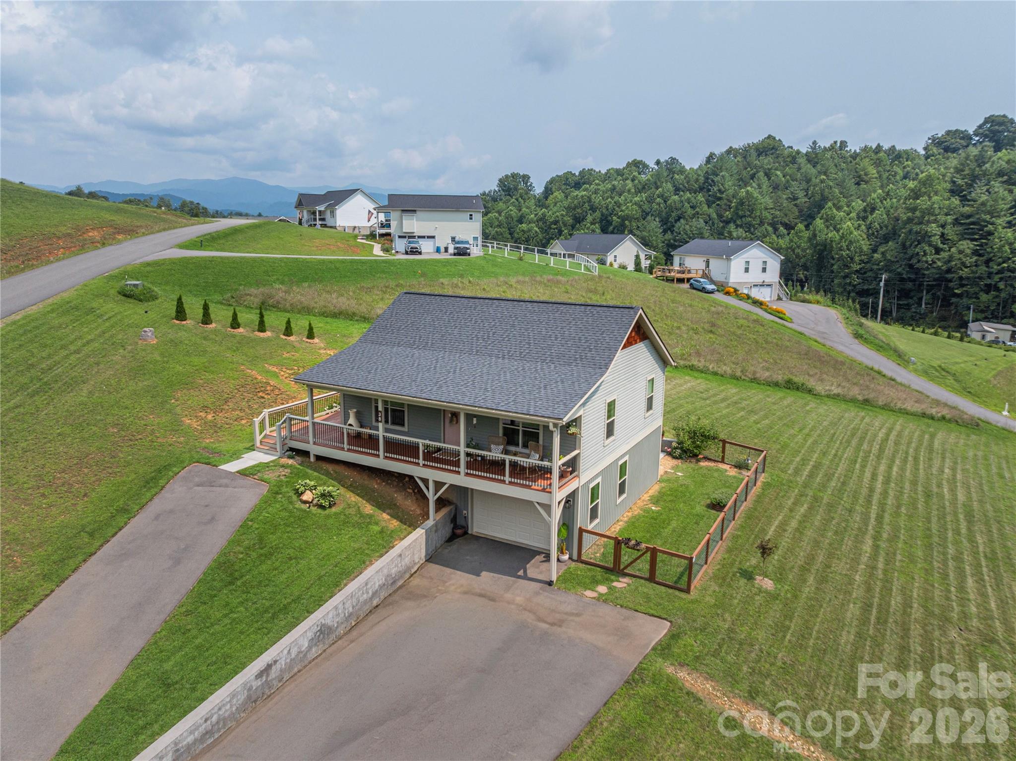 Great double driveway for multiple cars or parking fun toys or additional vehicles - 38 Sunrise Drive, Mars Hill
