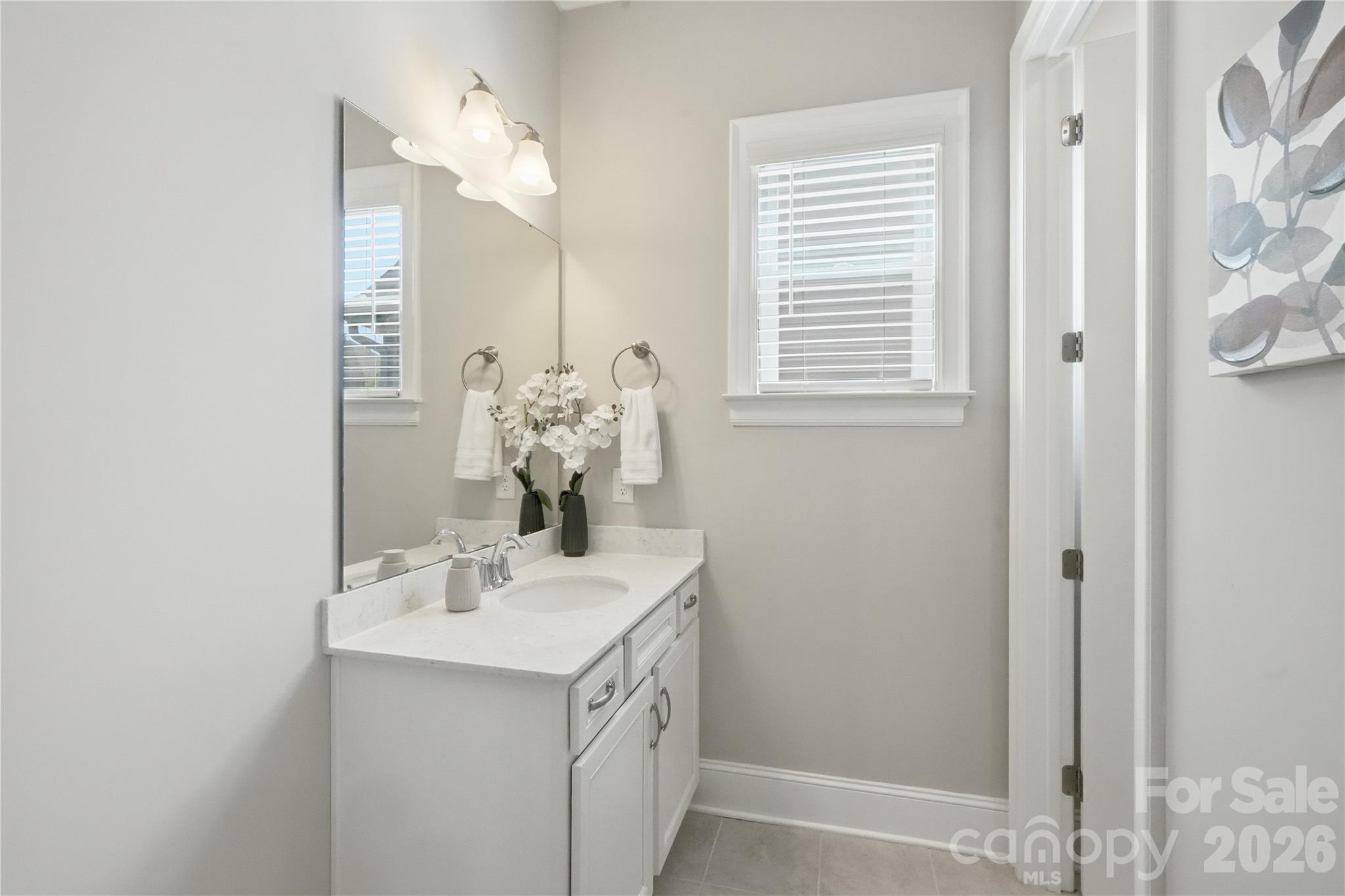 Full bath downstairs attached to bedroom and hall - 1621 Afton Way, Fort Mill
