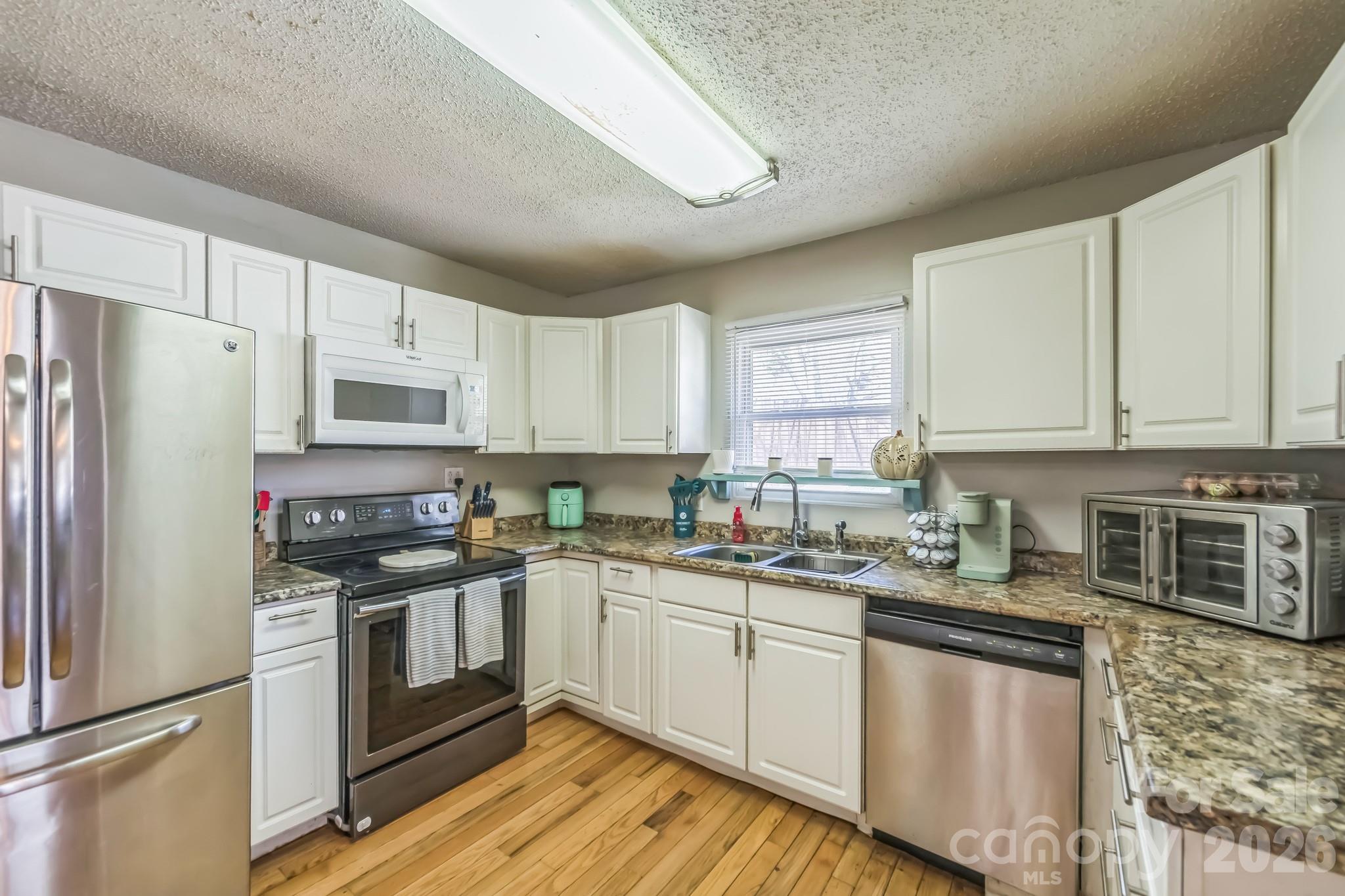 Single Family Residence at 2100 Pisgah Highway, Candler, photo 8 of 38
