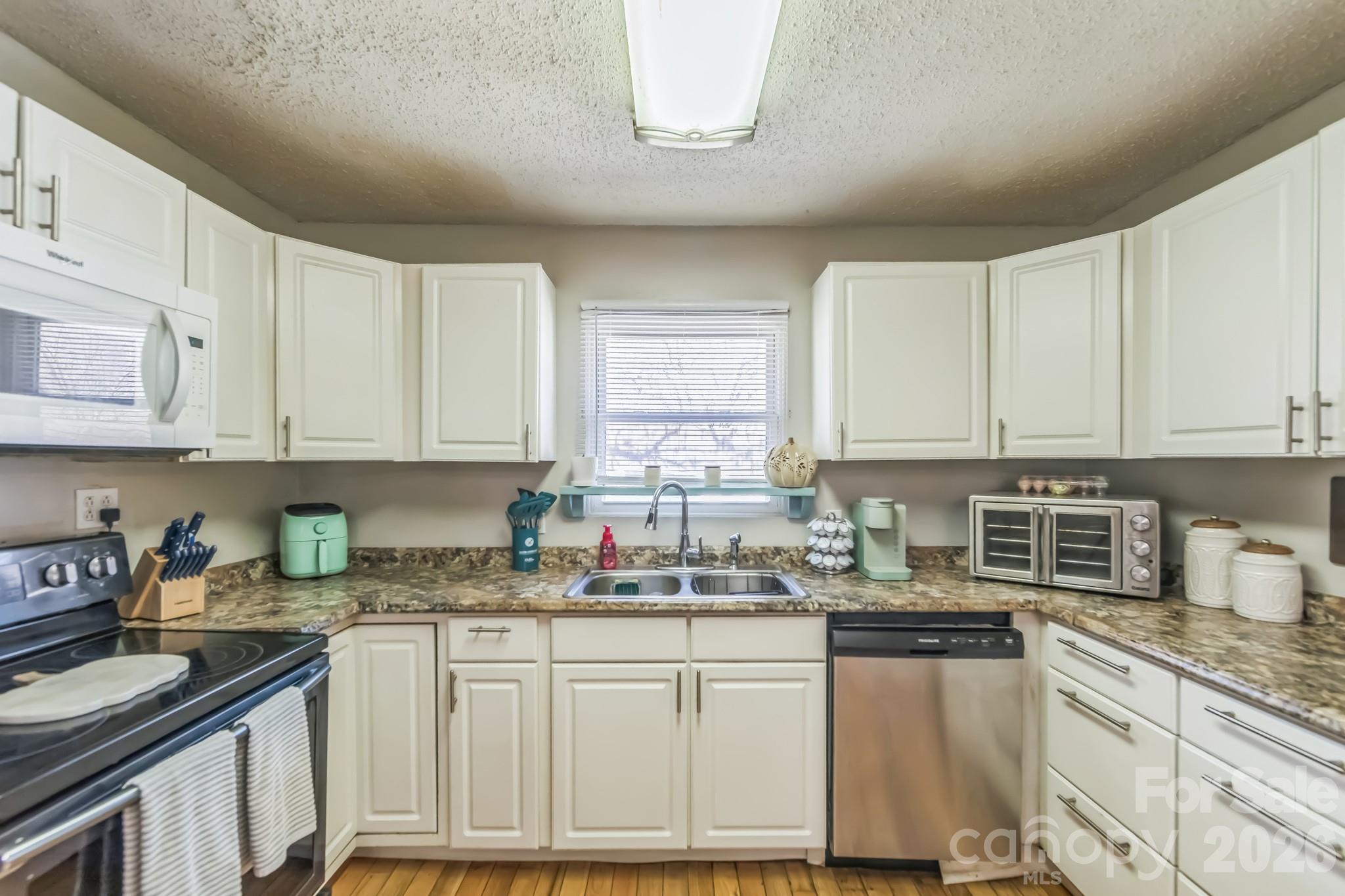 Single Family Residence at 2100 Pisgah Highway, Candler, photo 9 of 38
