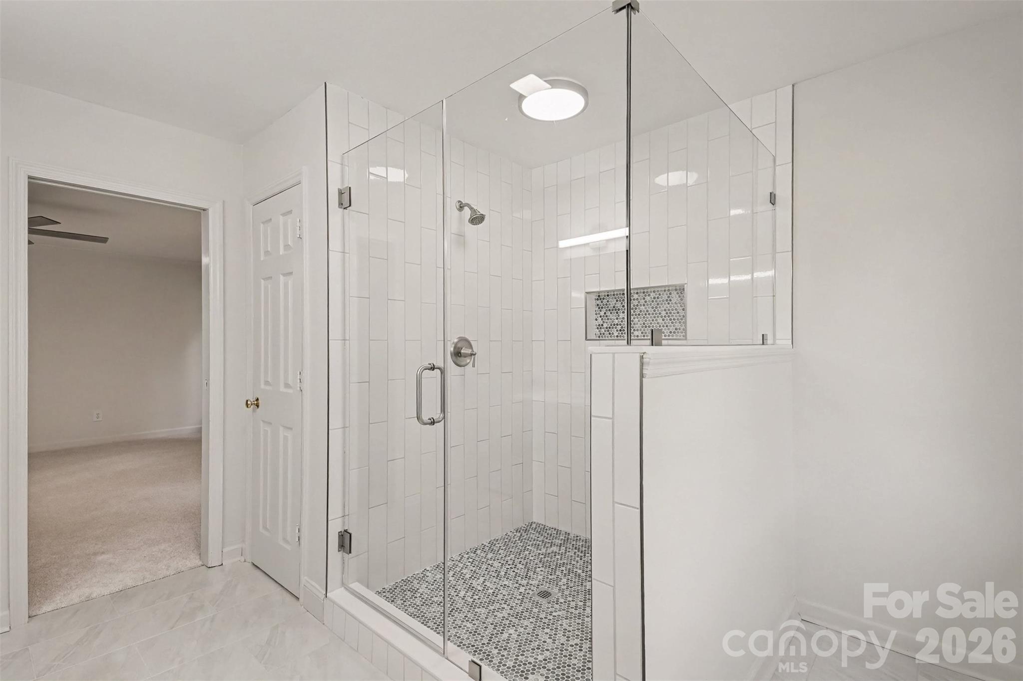 With a HUGE custom walk-in shower. - 13520 Andulusian Drive, Matthews