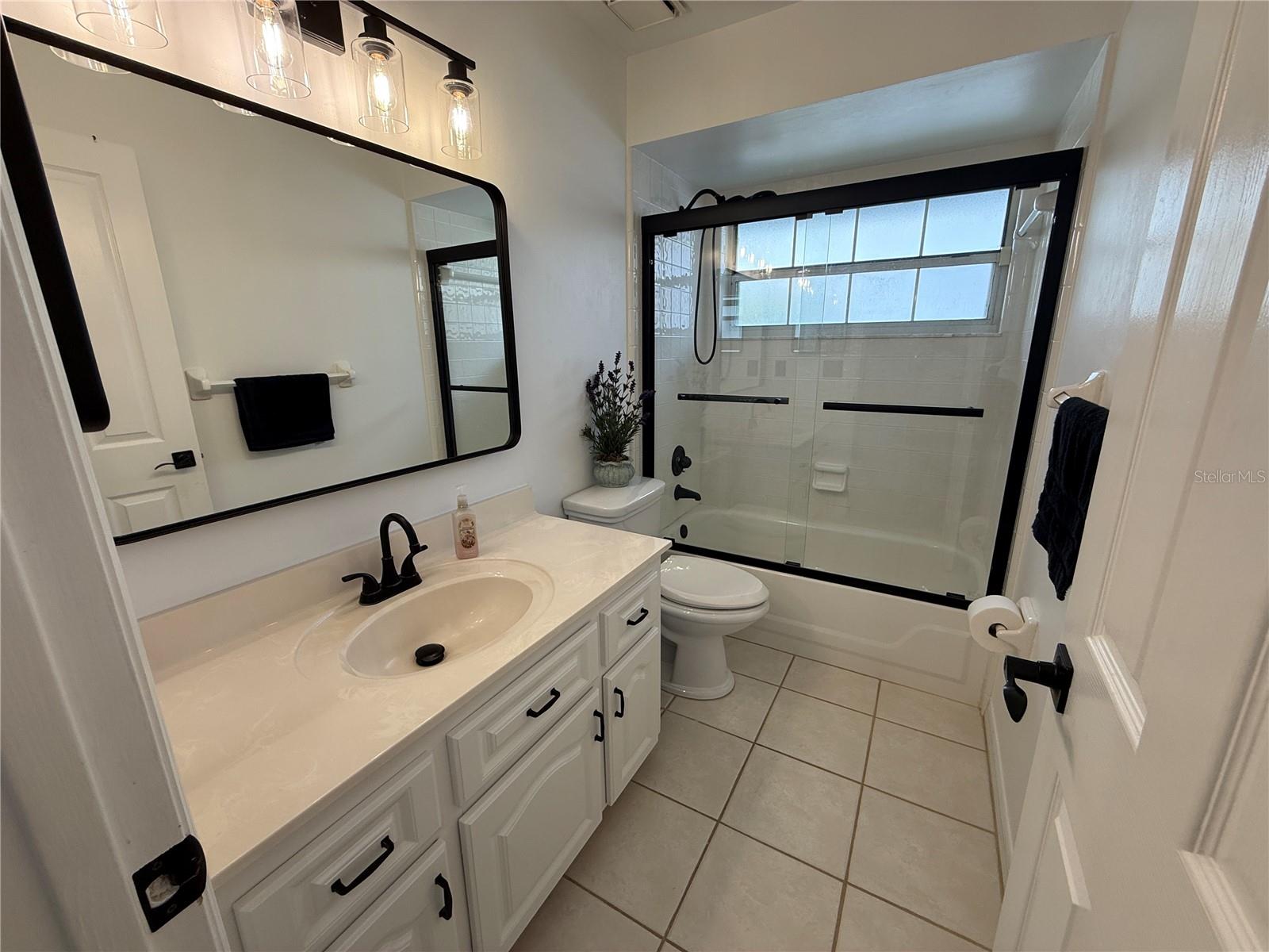 Guest bathroom - 77 CIMMARON DR, PALM COAST