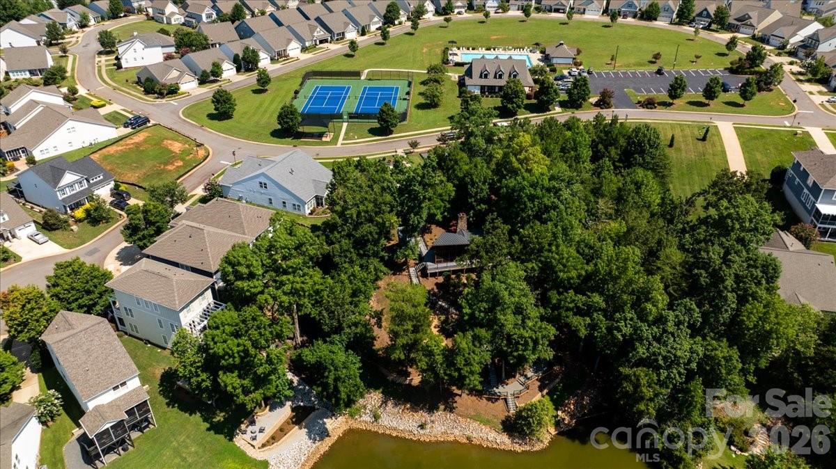 Pavilion overlooking the water which has a fire pit, screened in porch, putt putt, bocce ball, corn hole and picnic tables. - 11222 Island View Lane, Lancaster