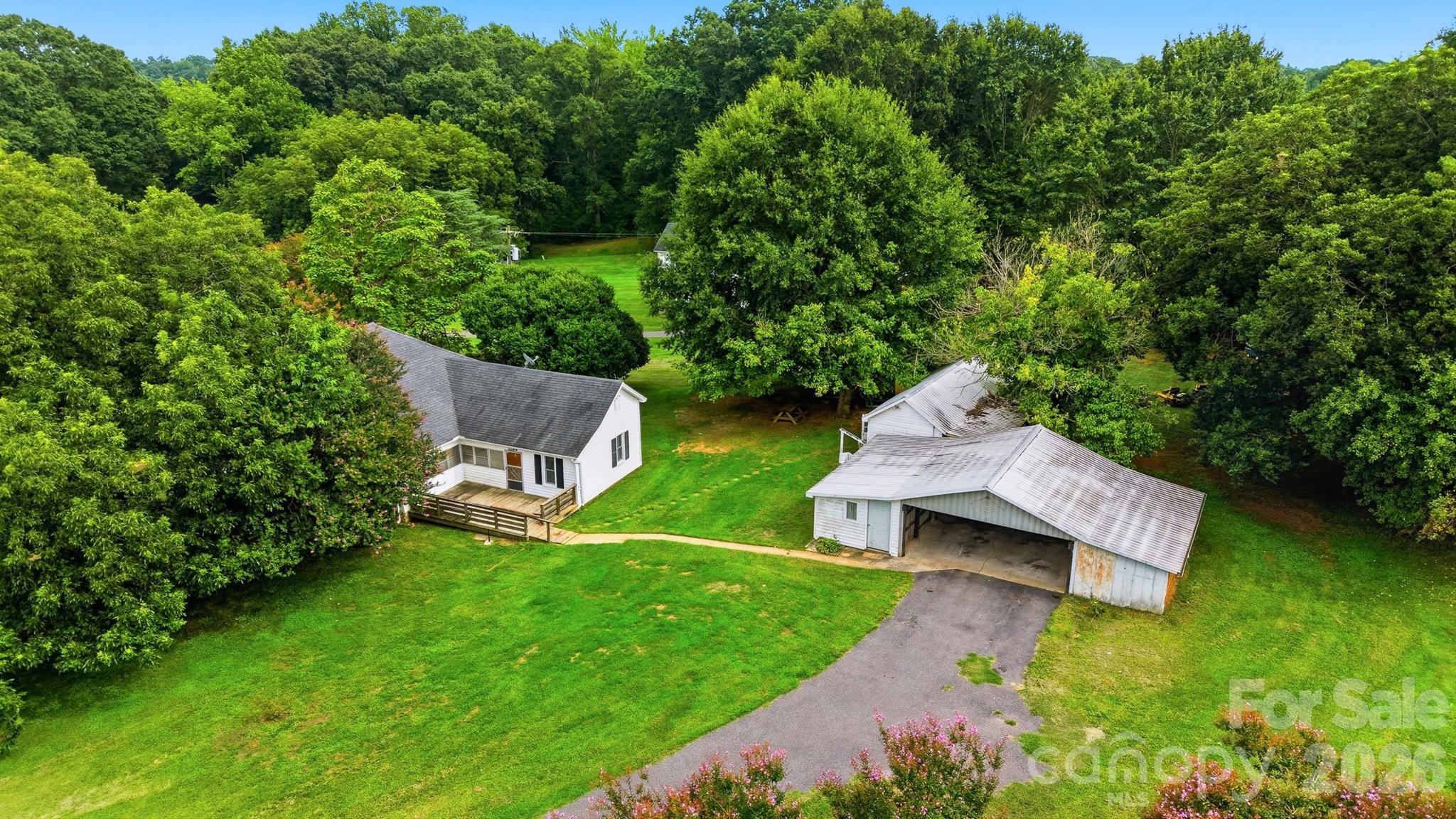 The house to the left is also on the market for $389,900. 1261 Davis Rd - 1289 Davis Road, Lincolnton