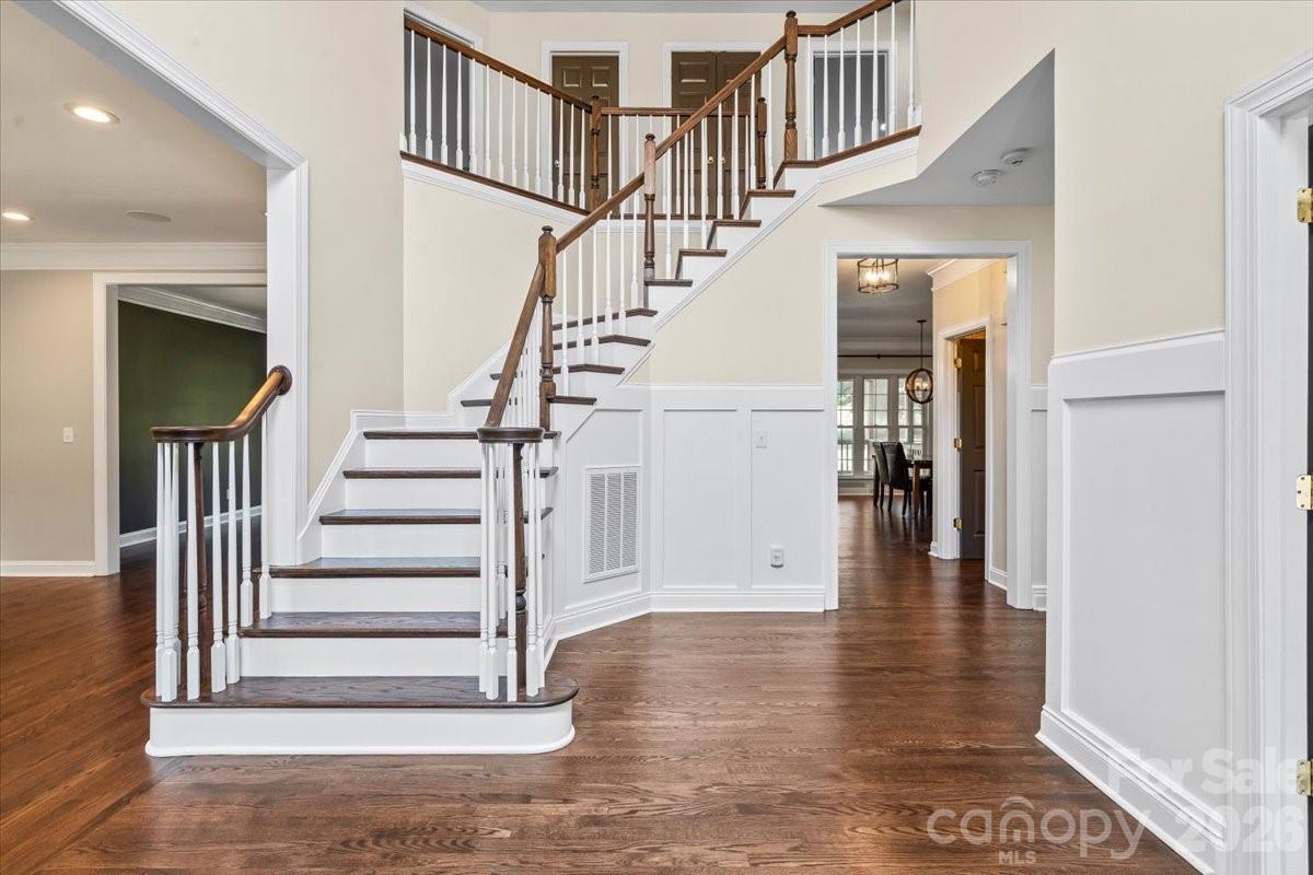 Elegant and timeless entry. Wood floors refinished in 2023, and new wood on stairs in 2023 - 109 Pauls Lane, Mooresville