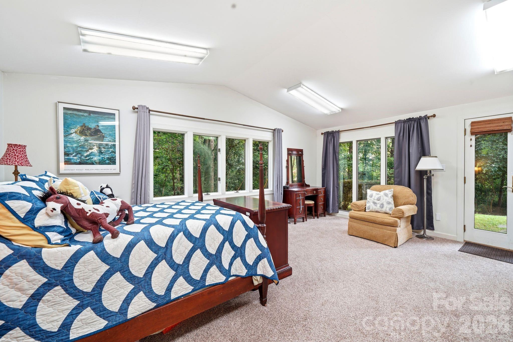 Lower Level Bedroom with private entrance to front of the home. - 515 Dogwood Lane, Belmont