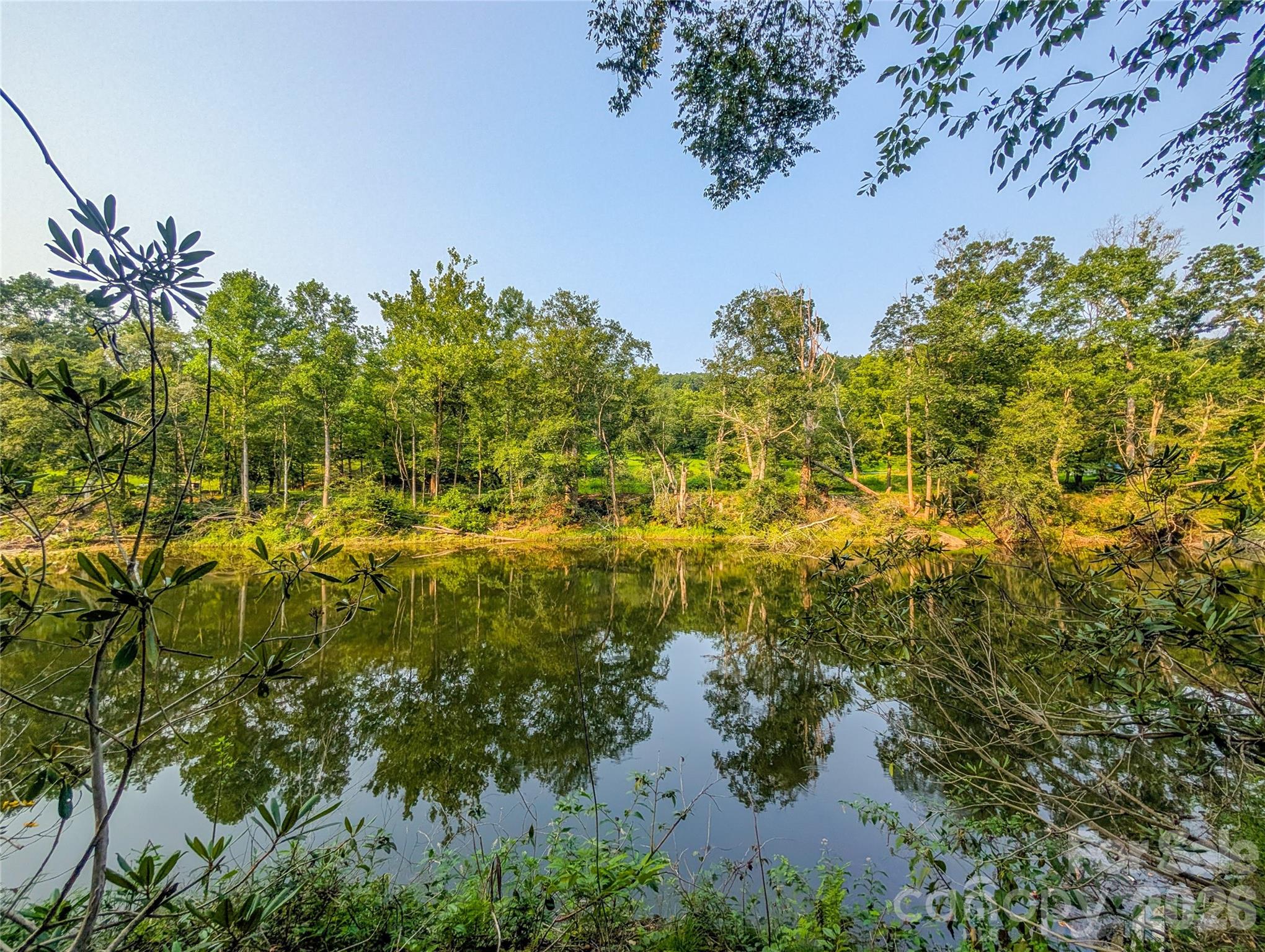 South Toe River Frontage! - 328 Wooded Valley Lane, Burnsville