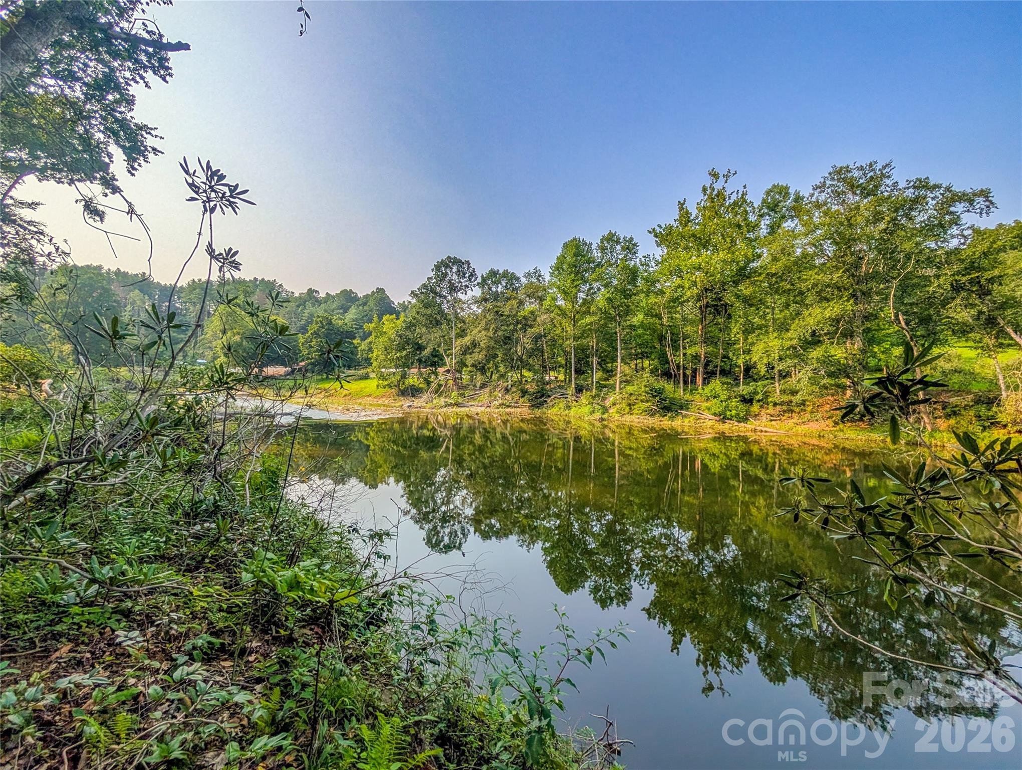 View of South Toe River Frontage! - 328 Wooded Valley Lane, Burnsville