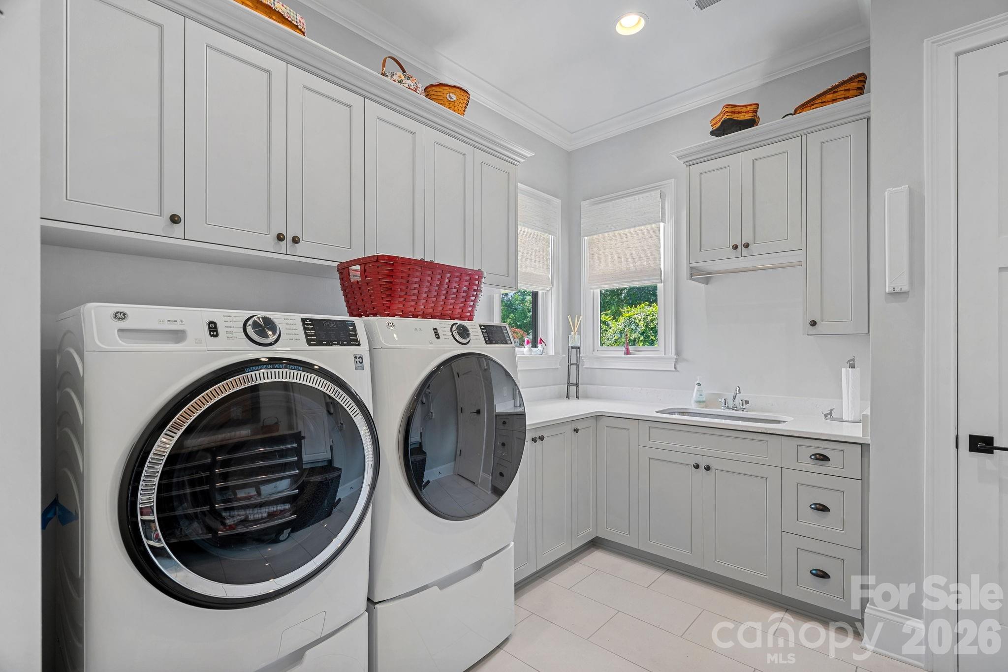 Expansive laundry room with sink and lots of storage - 2889 Mount Pleasant Road, Sherrills Ford