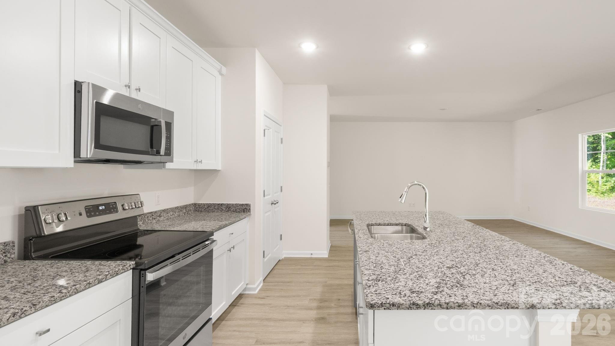 Kitchen with stainless appliances, - 4022 Rolling Creek Road, Vale