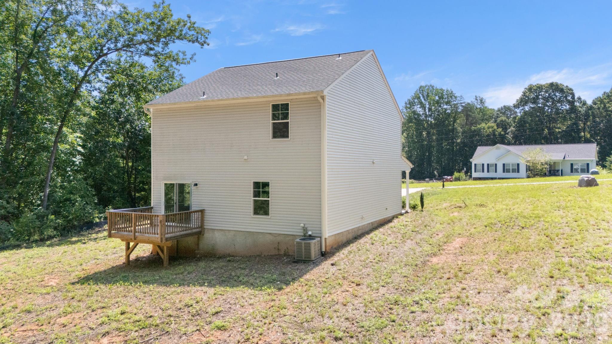 Back of house with deck - 4022 Rolling Creek Road, Vale