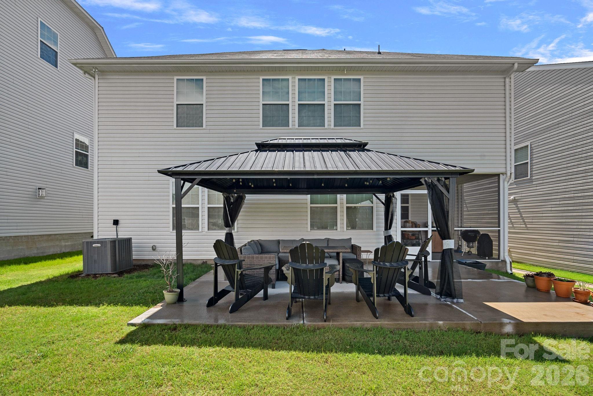 Great pergola provides shade. Screened in porch by it. - 262 Abersham Drive, Mooresville