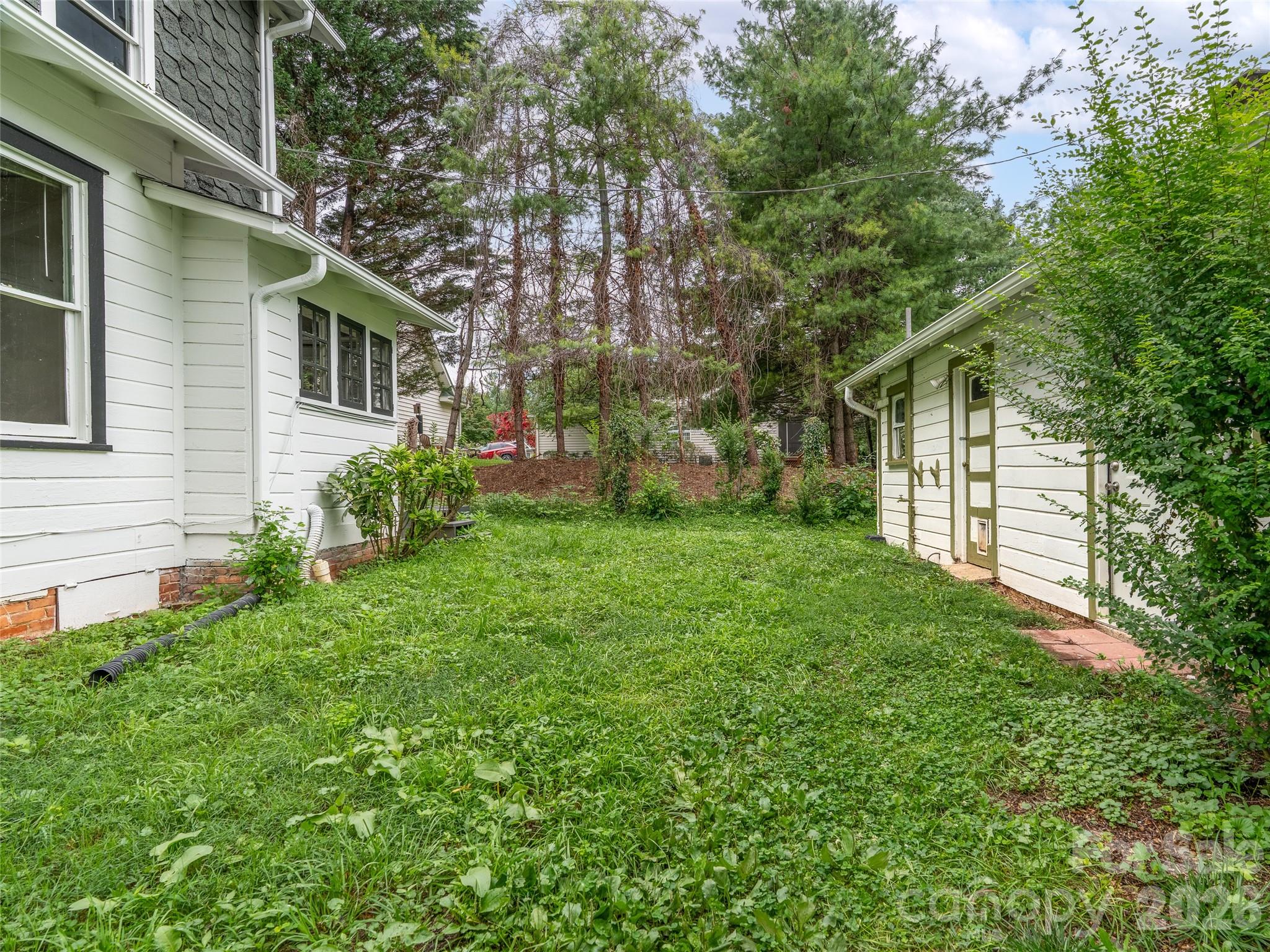 Side Yard Between Main House & Studio - 111-113 Stewart Street, Hendersonville