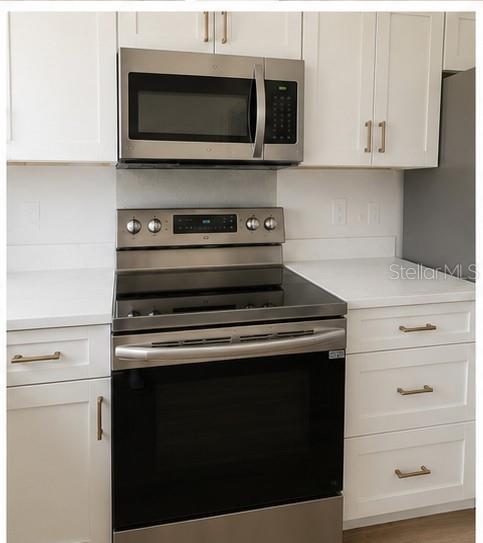 Condominium at 9030 BLIND PASS RD #D6, ST PETERSBURG, photo 9 of 18