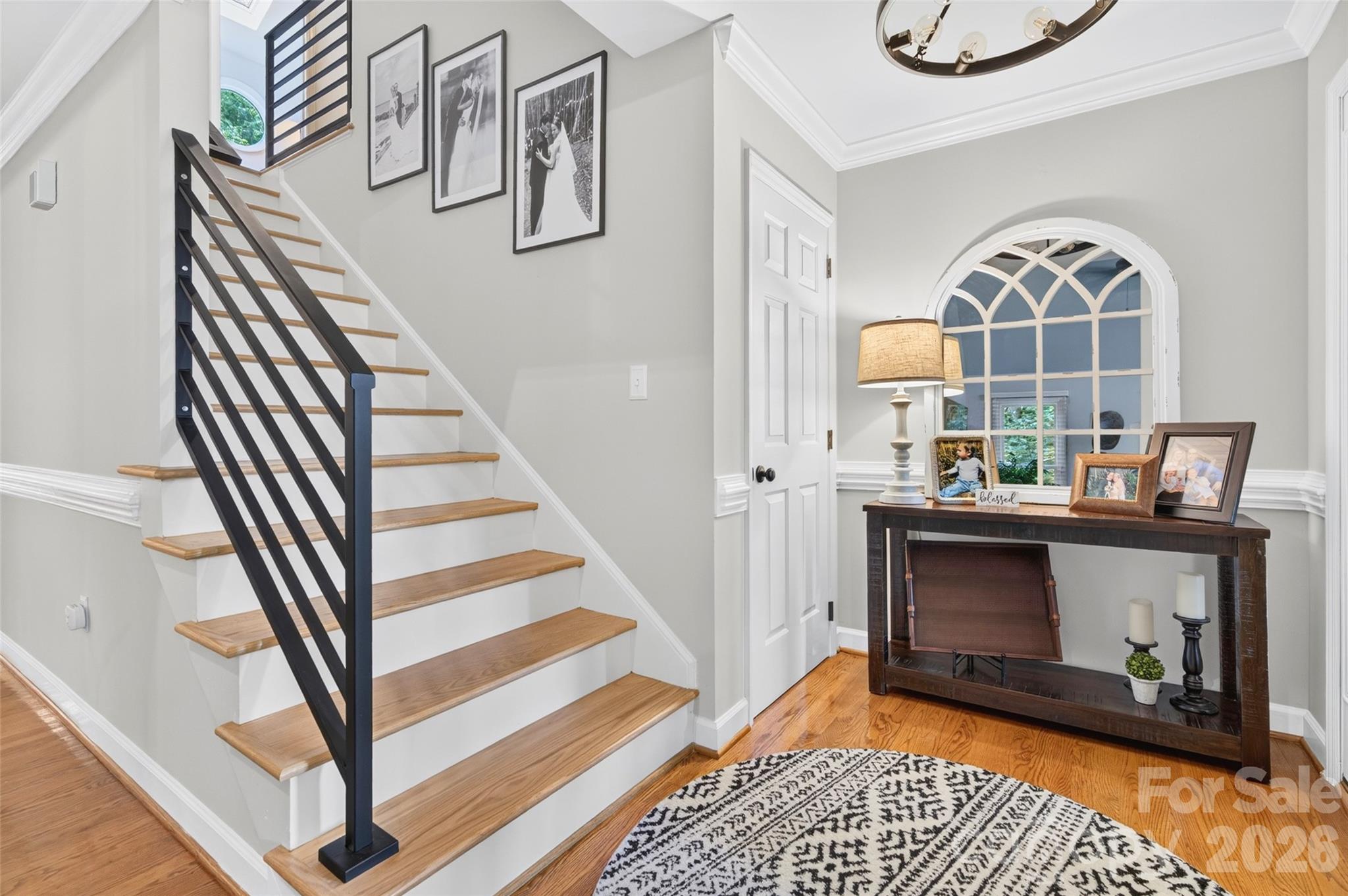 Remodeled hardwood stairs with open modern railings - 1345 Gaston Day School Road, Gastonia