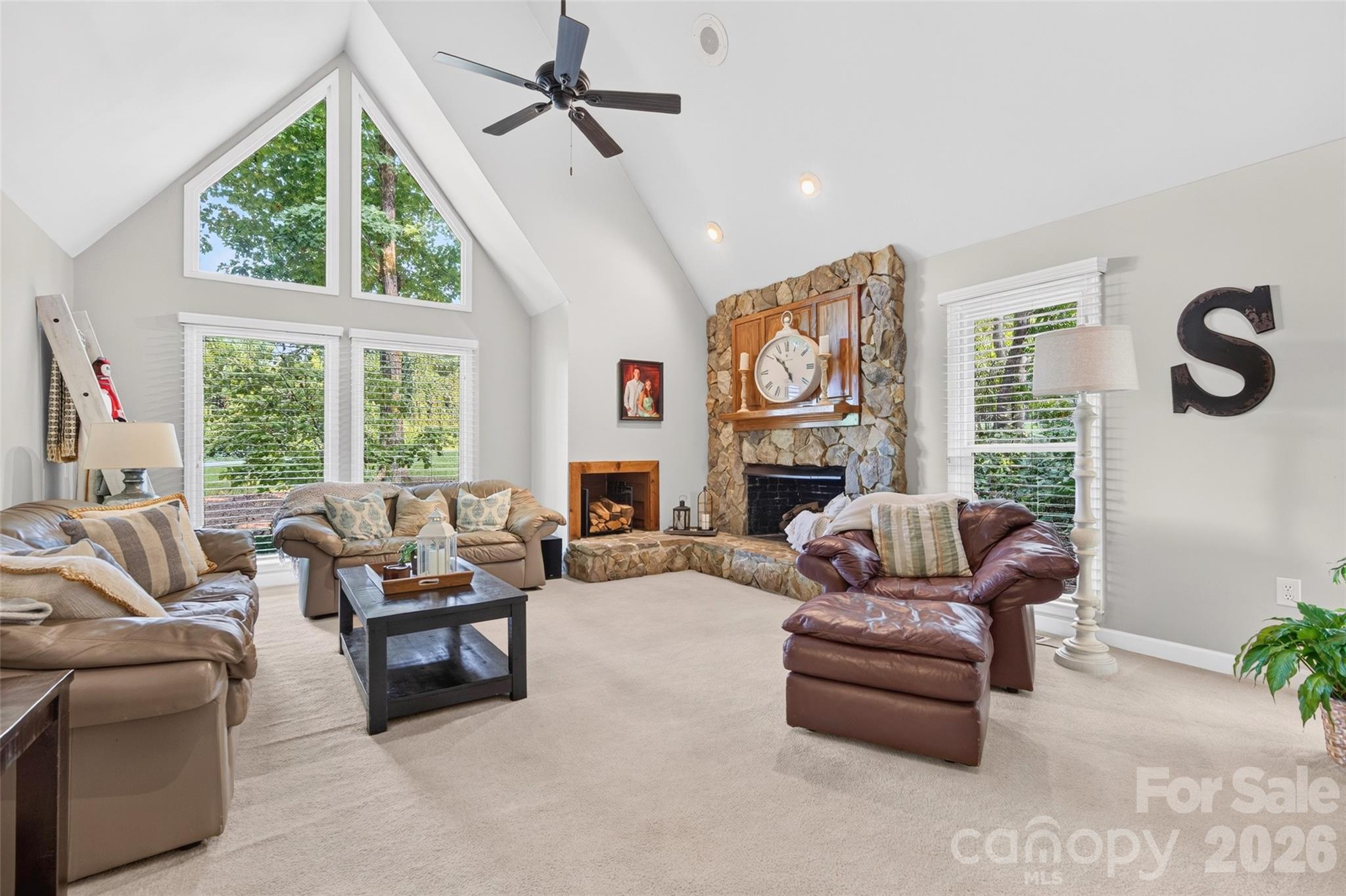 Dramatic vaulted Great room anchored by a vertical stone ? hearth & fireplace? - 1345 Gaston Day School Road, Gastonia