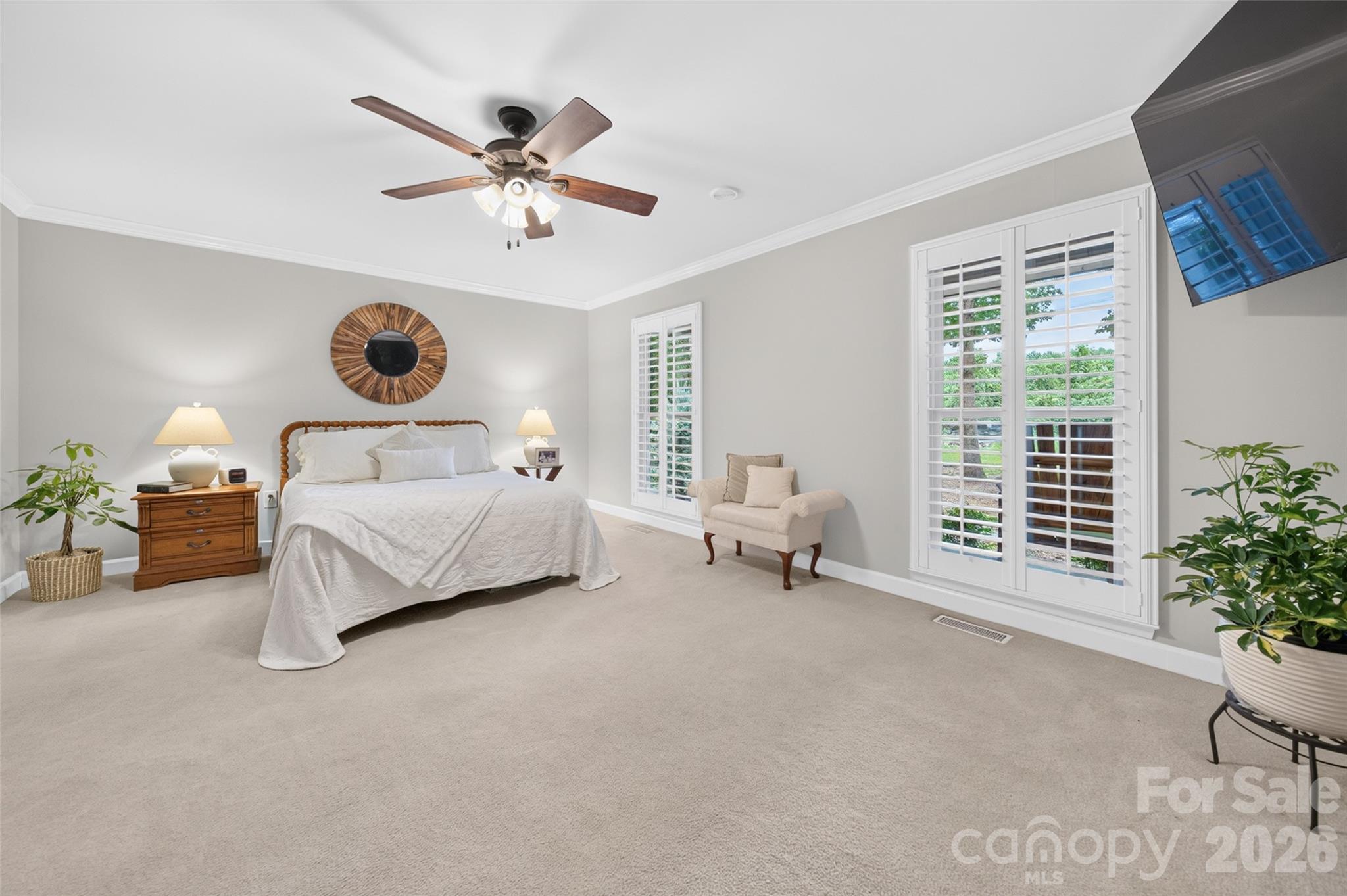 PRIMARY Suite on the main floor w/ Plantation Shutters - 1345 Gaston Day School Road, Gastonia