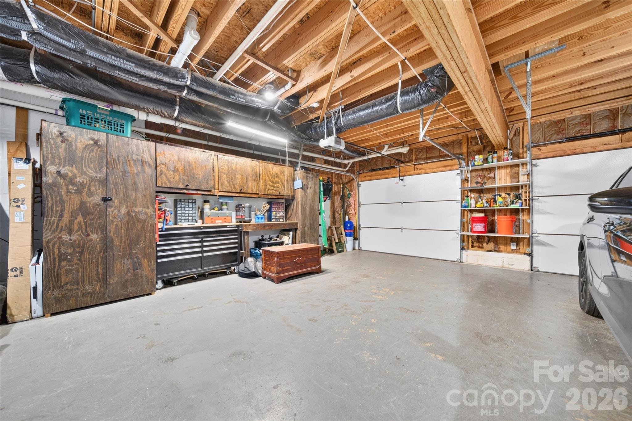 Garage = 796 sft w/ Built-in cabinets and storage - 1345 Gaston Day School Road, Gastonia