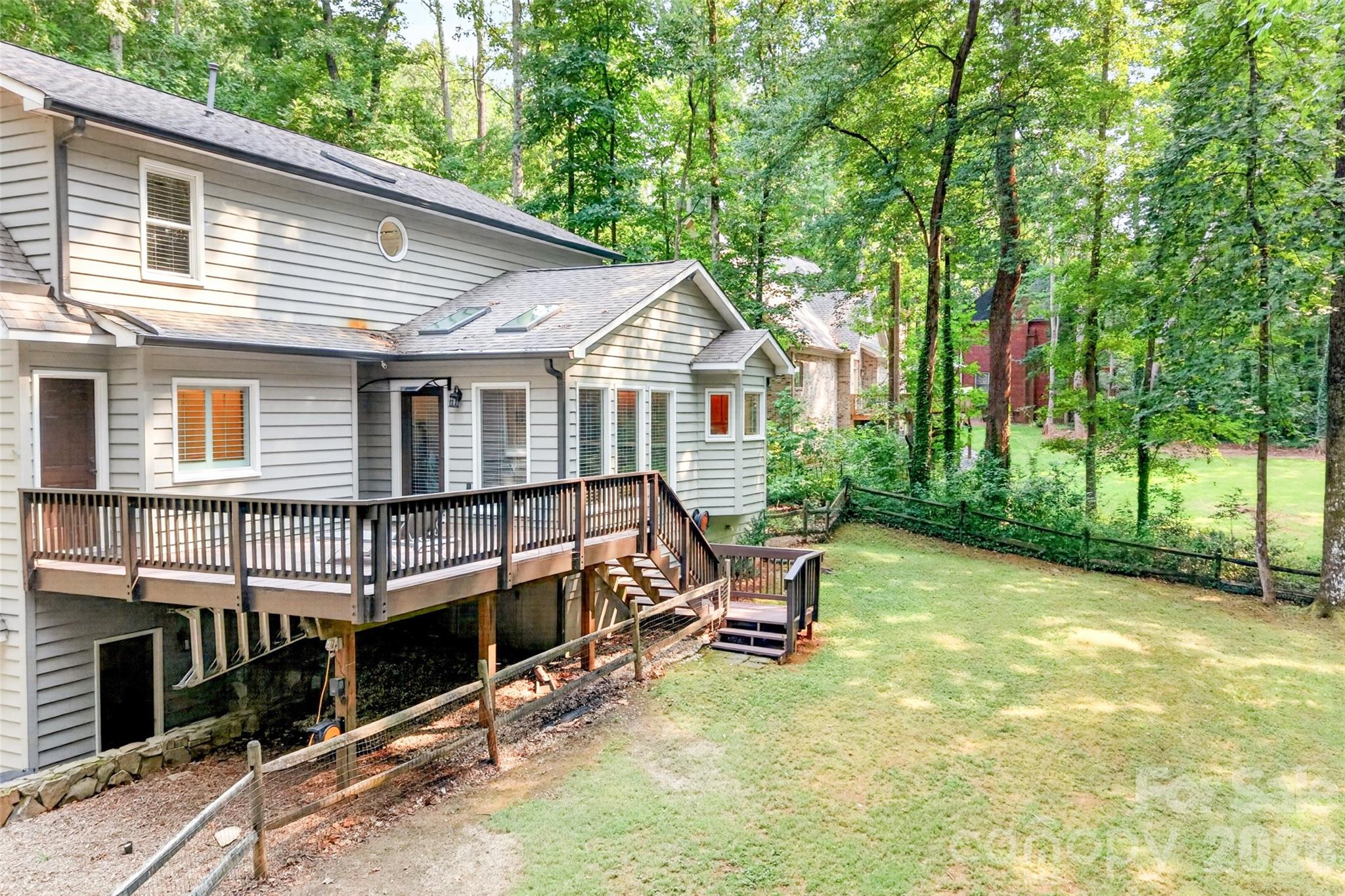 Deck overlooking the Fenced back yard - 1345 Gaston Day School Road, Gastonia