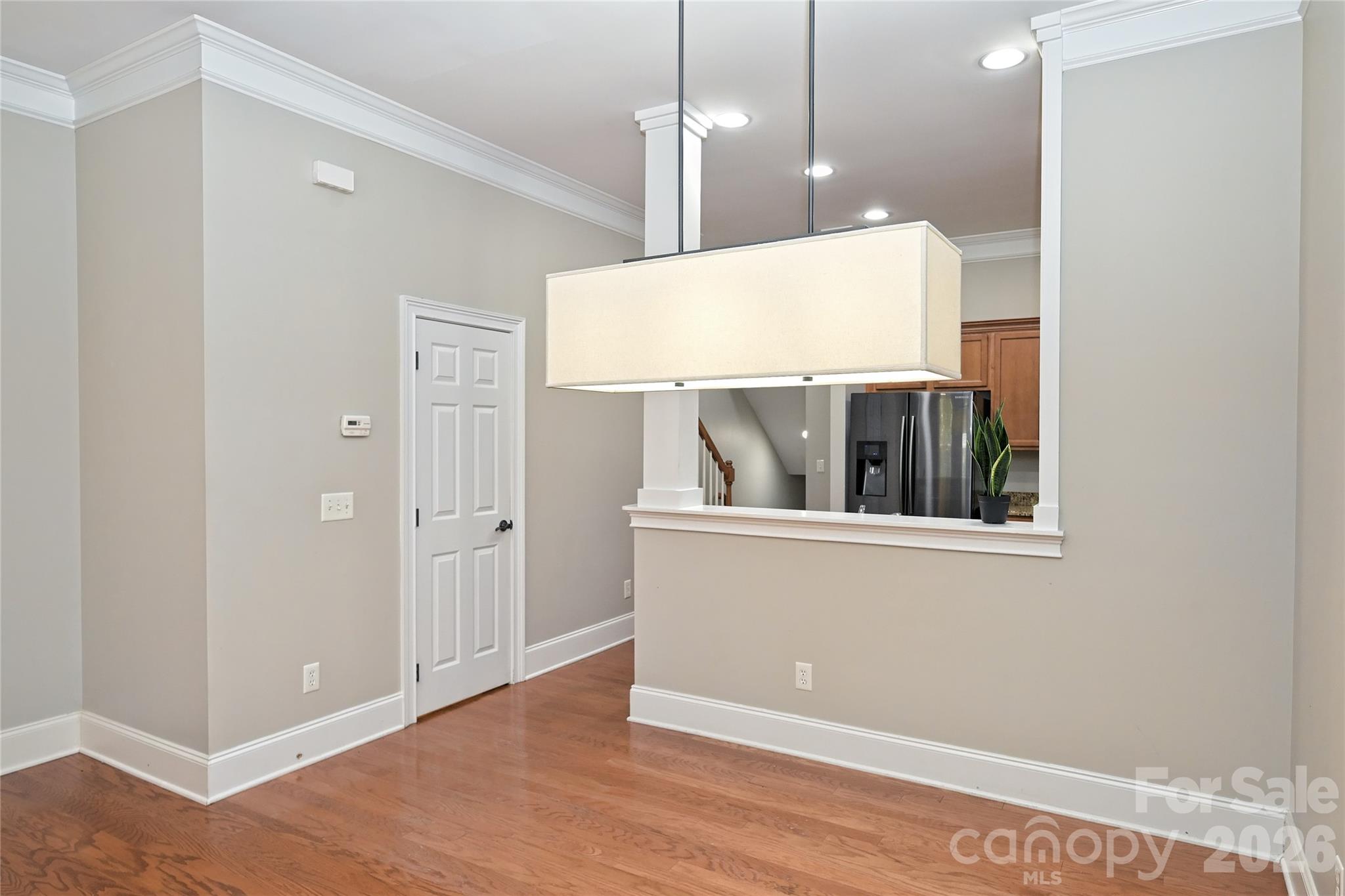 DINING ROOM with adjacent powder room - 5732 Village Drive NW, Concord
