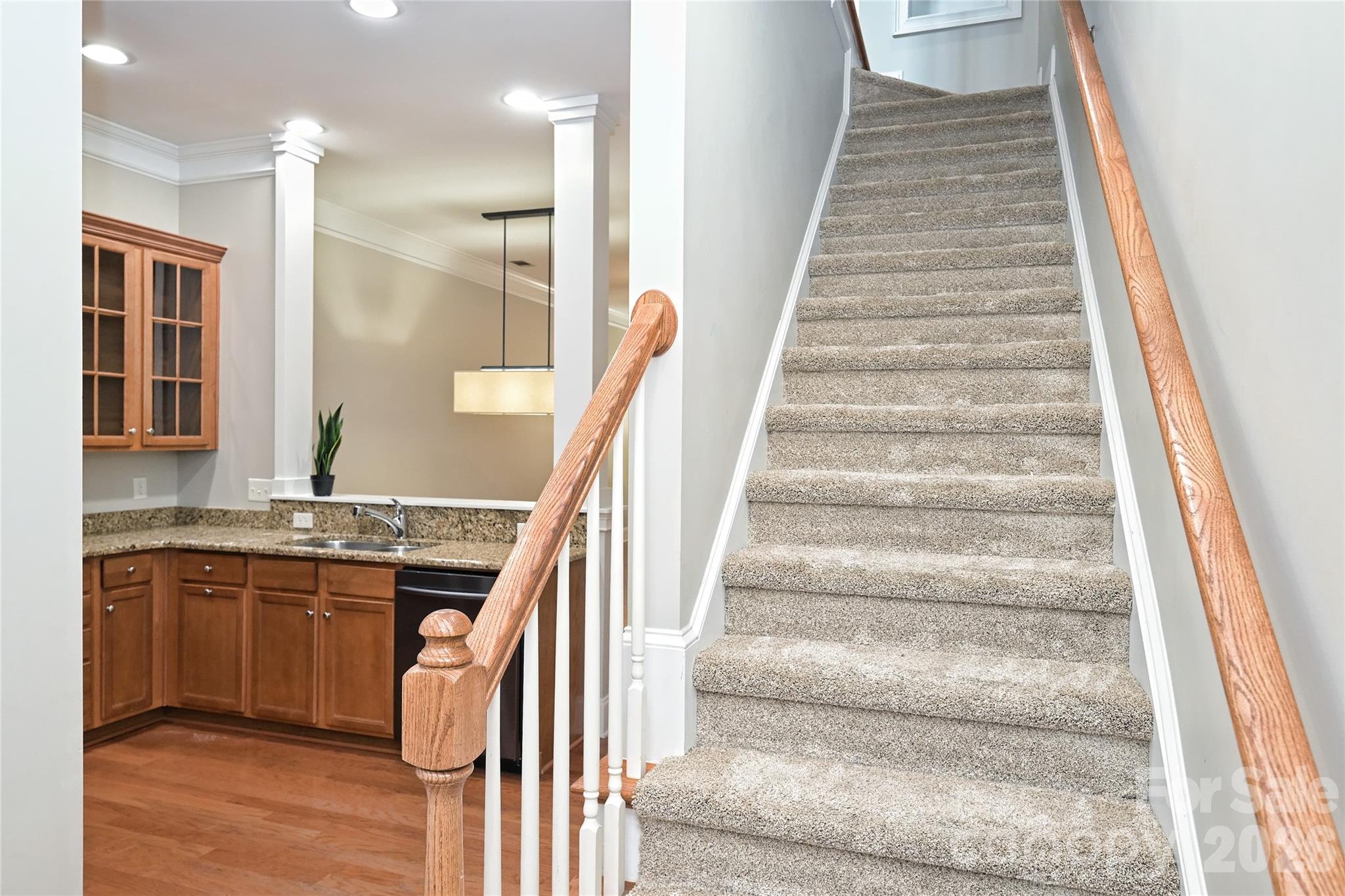 Rear stairs to 2nd Floor and kitchen - 5732 Village Drive NW, Concord
