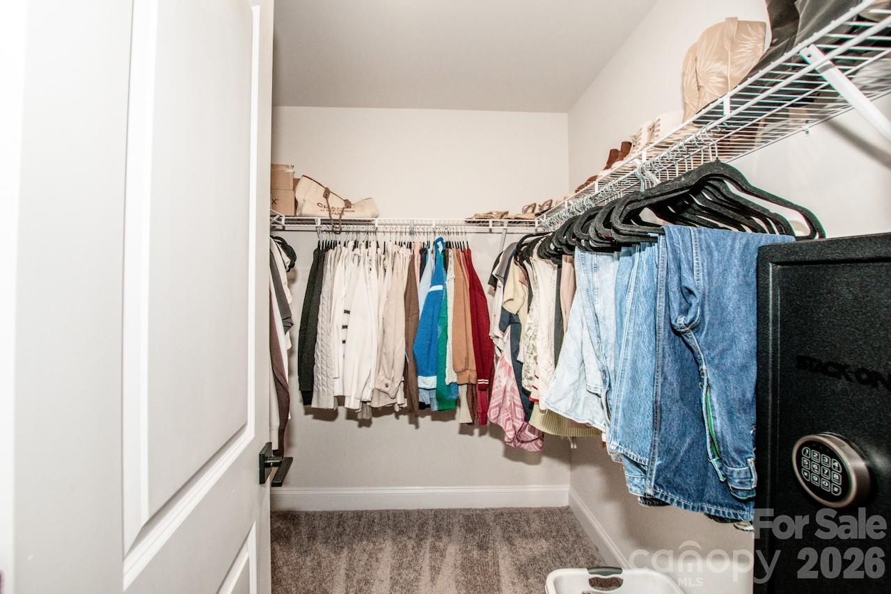 Large Primary Walk-in Closet - 119 Brixham Loop, Troutman