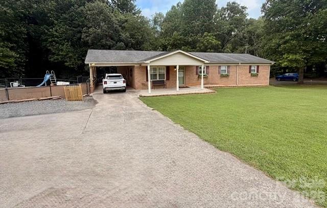 Single Family Residence at 1702 Cajah Mountain Road, Hudson, photo 2 of 35