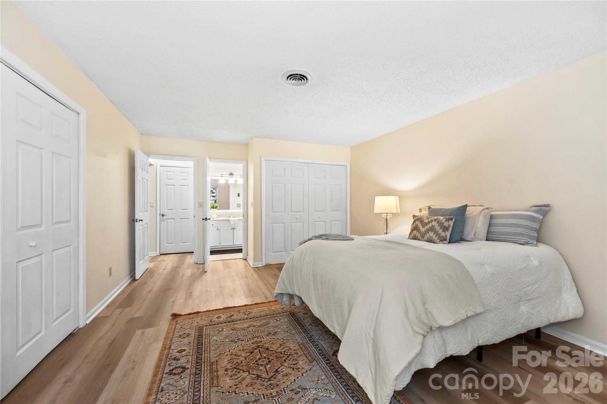 Primary Bedroom looking on to ensuite - 181 N Britton Creek Court, Hendersonville