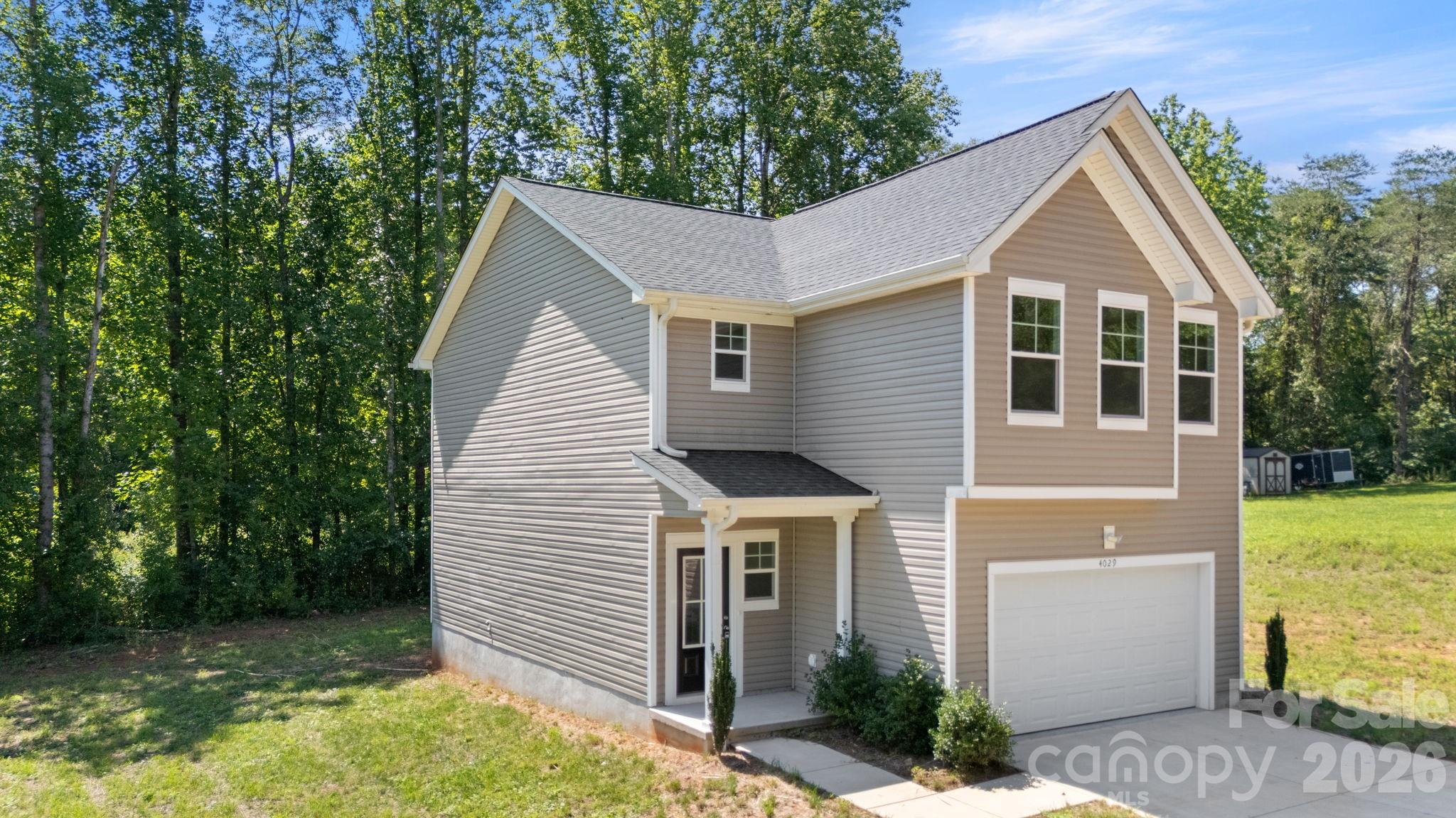Front exterior and Side - 4029 Rolling Creek Drive, Vale