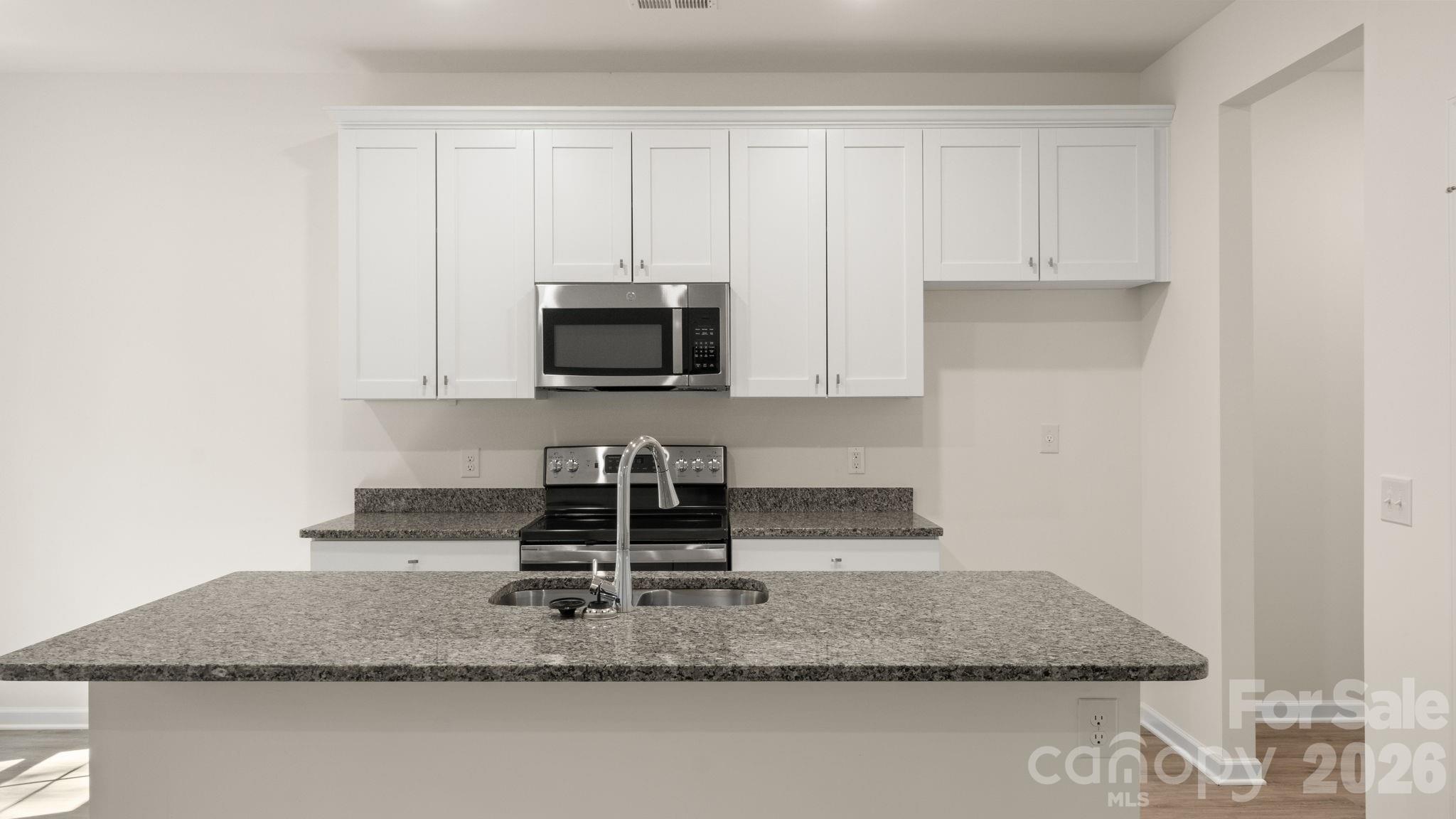 Kitchen with plenty of cabinets for storage - 4029 Rolling Creek Drive, Vale