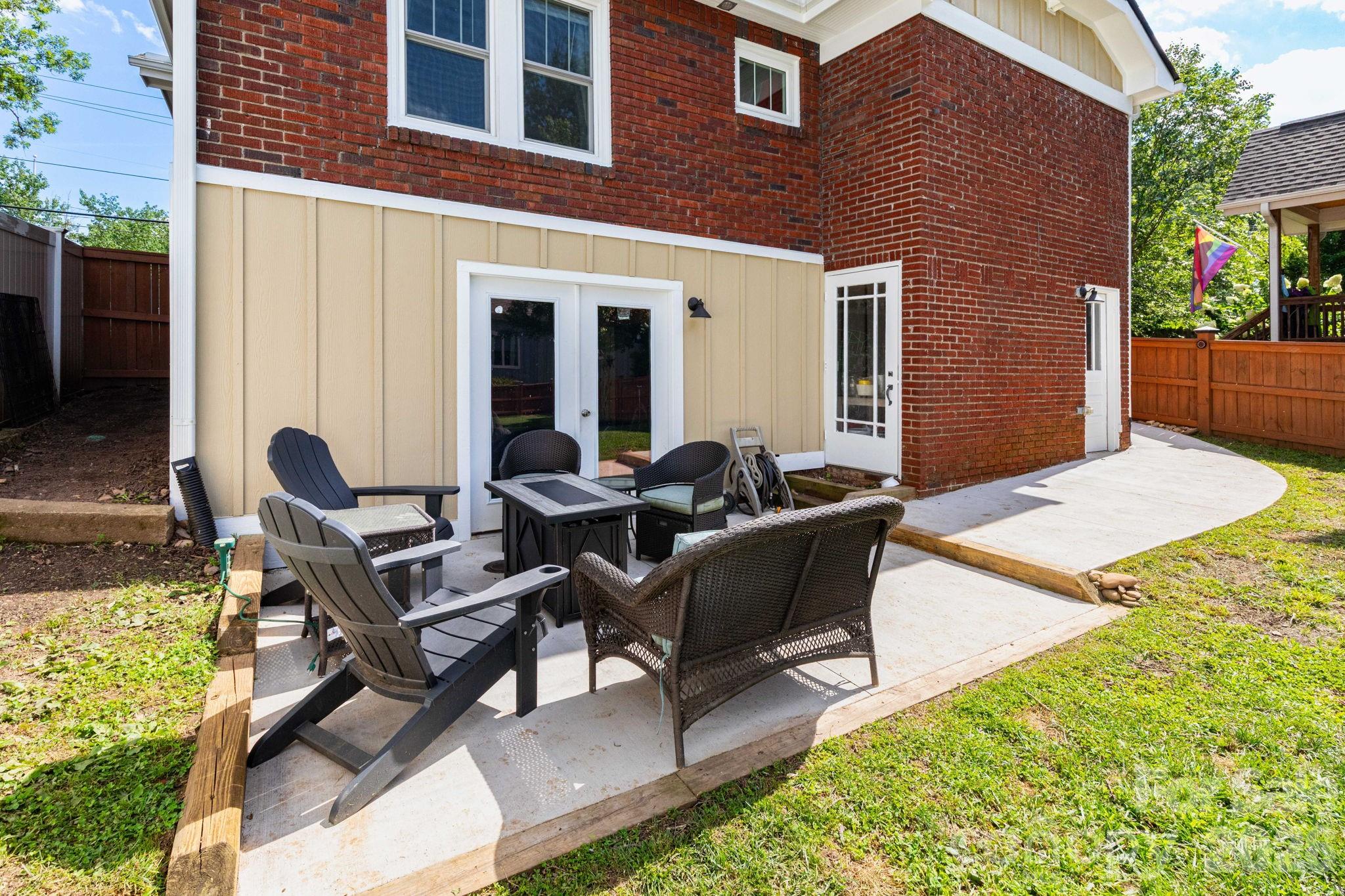 Back patio and basement entrance - 752 Fairview Road, Asheville