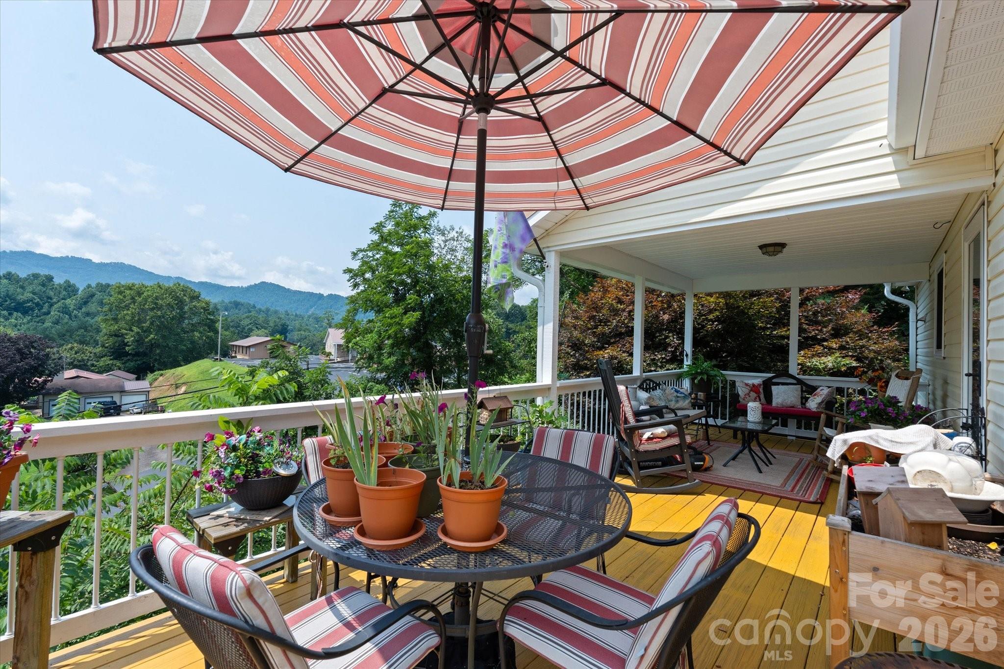 Partially covered deck with year round long range views! - 530 West Side Road, Burnsville