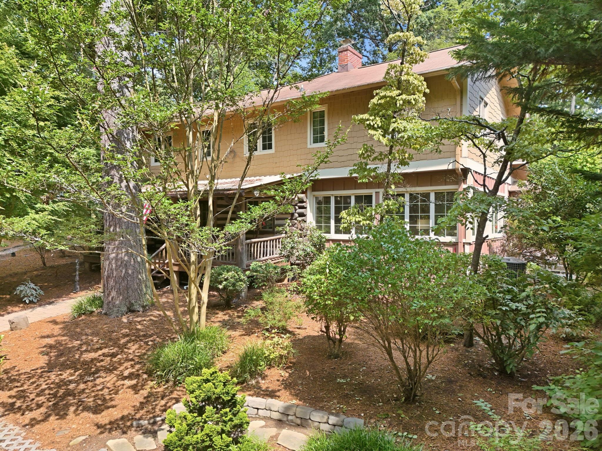 Right front of property highlighting mature landscaping - 1925 Laurel Park Highway, Hendersonville