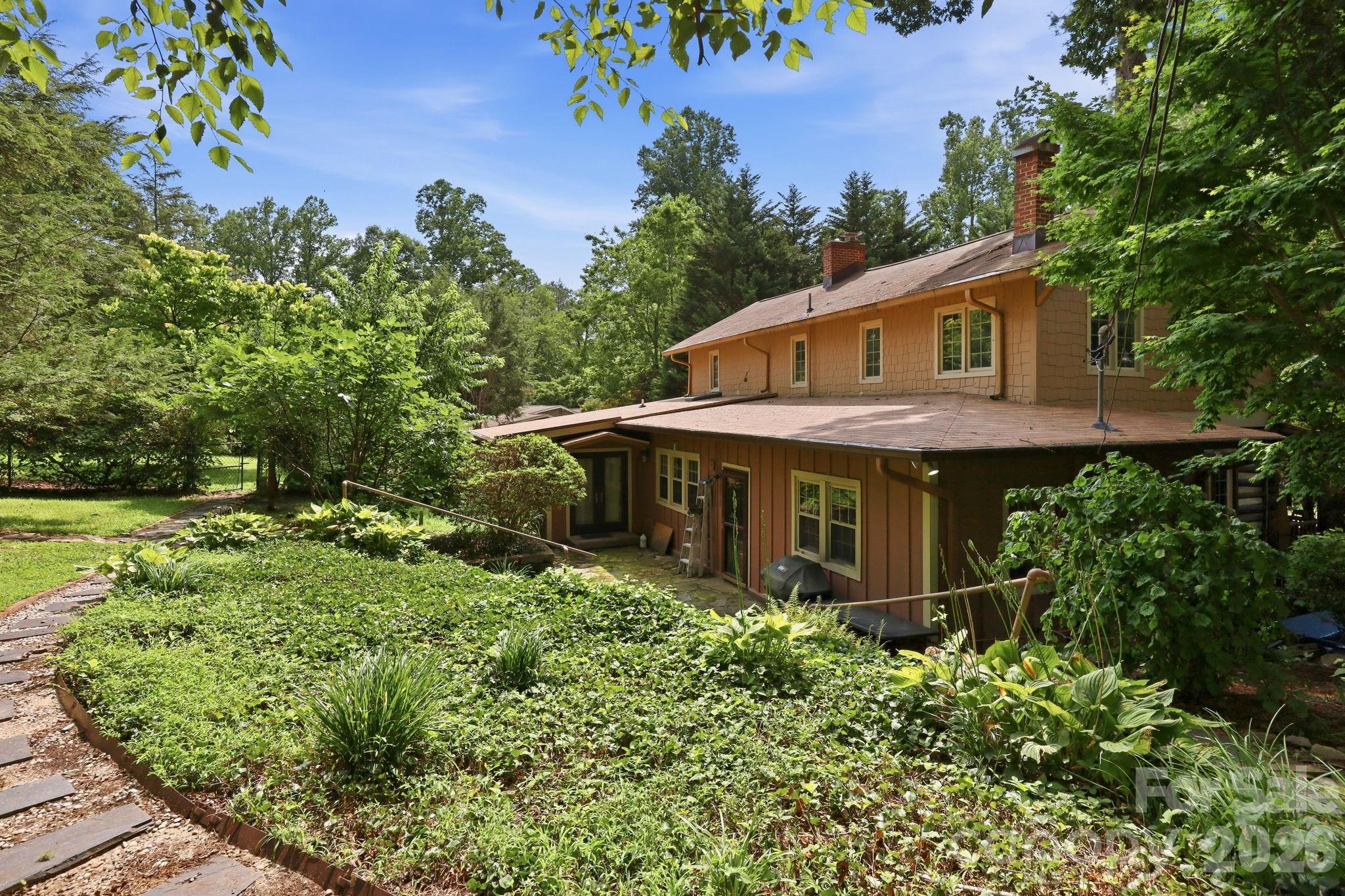 Rear of property with mature landscaping - 1925 Laurel Park Highway, Hendersonville