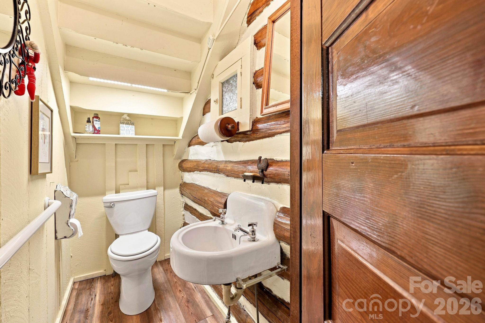 1/2 bath located underneath stairs - 1925 Laurel Park Highway, Hendersonville