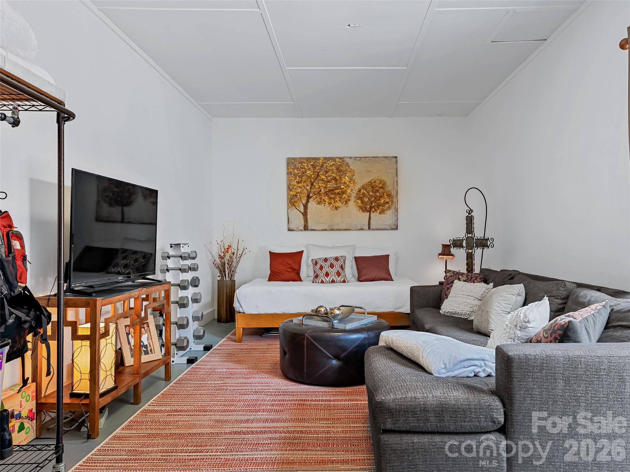 The garage has been converted to a versatile bonus room - 7 Southwicke Drive, Arden