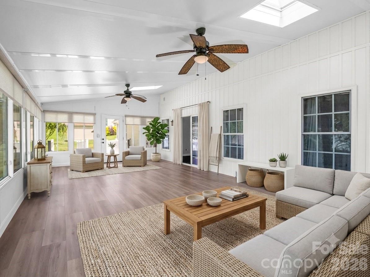 29 x 15 Sunroom with new LVP + mini-split (virtually staged) - 355 Hidden Meadow Drive, Hendersonville