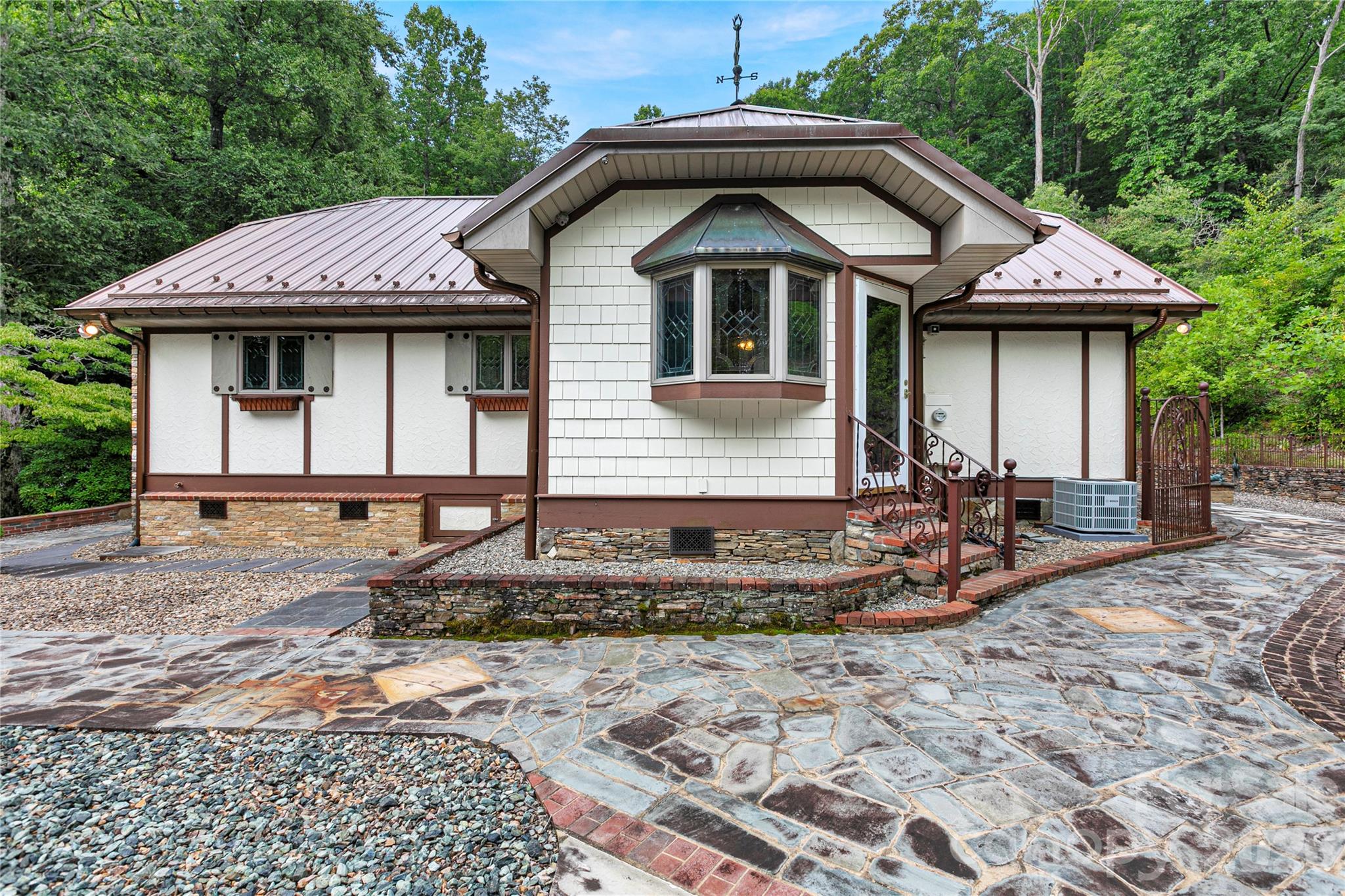 This door leads to the bonus room! Bay windows with stained glass! Small family guest bedroom? Sitting reading meditation room? So many possibilities for it! - 275 Hubbard Hollow Road, Rosman