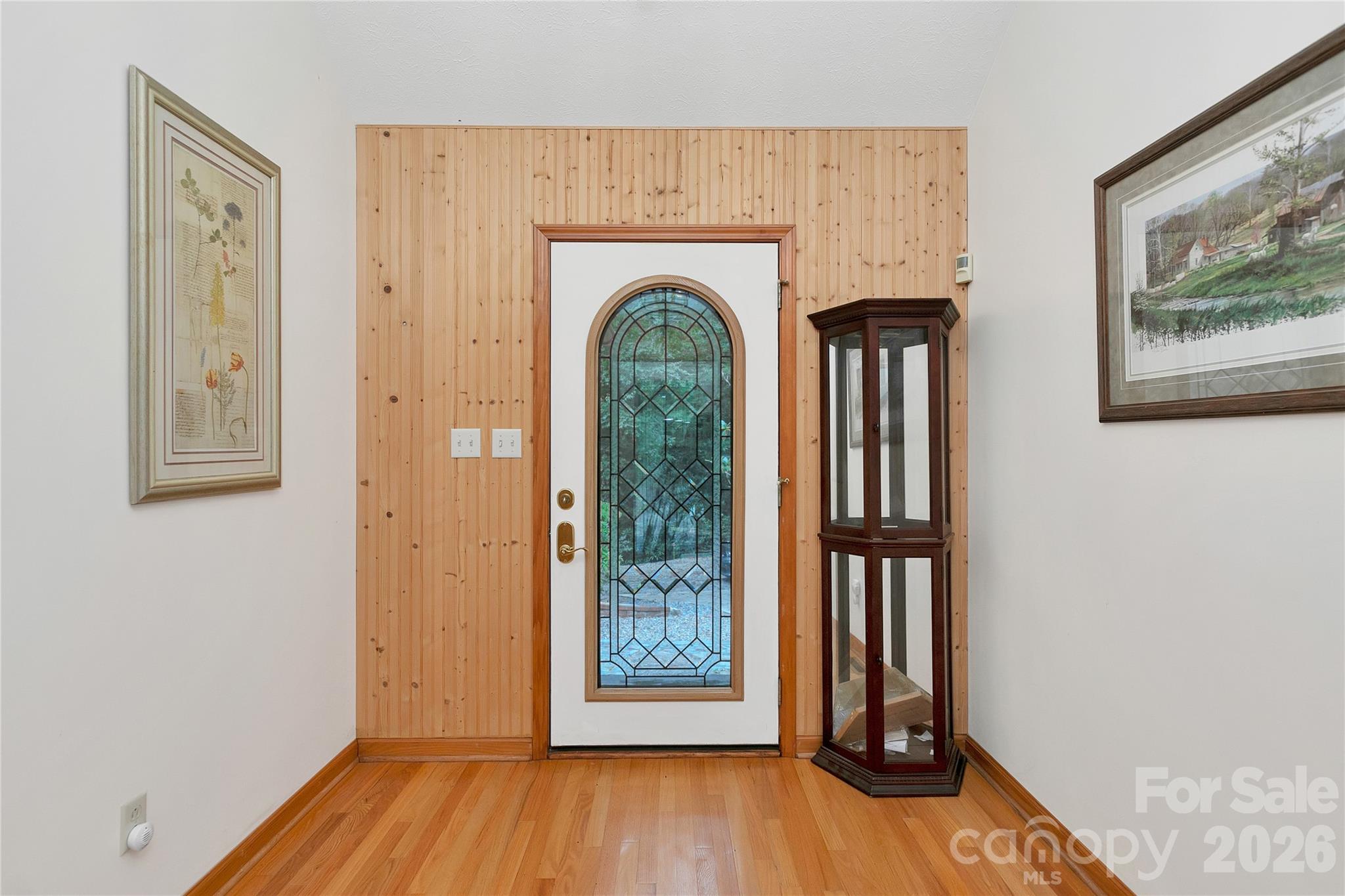 Entering the stained-glass rear door you are in the large entry way / foyer with its stained-glass front door! - 275 Hubbard Hollow Road, Rosman