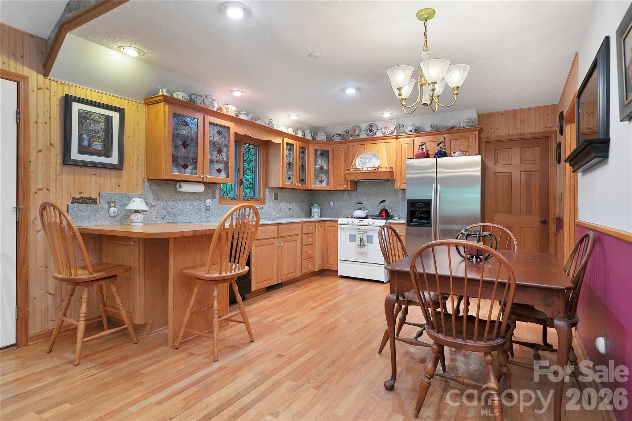 The kitchen and dining area are quite nice and very efficient at the same time. Lots of cabinet space, counter space, breakfast bar, and ample room to move around.! - 275 Hubbard Hollow Road, Rosman