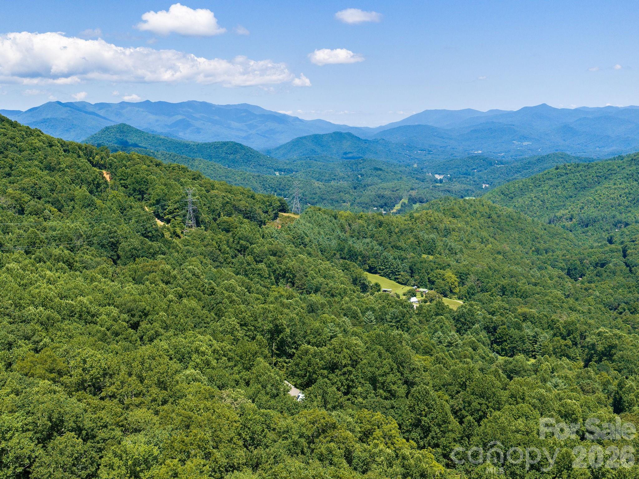 A true mountain retreat with nearby access to hiking trails and National Forest lands, offering endless opportunities to explore and enjoy the outdoors - 1572 Brushy Fork Road, Sylva