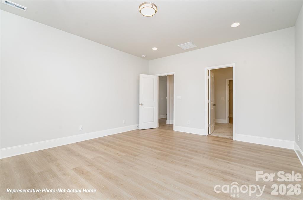 Example primary Bedroom.*Not actual home. - 10225 Rainier Trail Drive NW, Huntersville